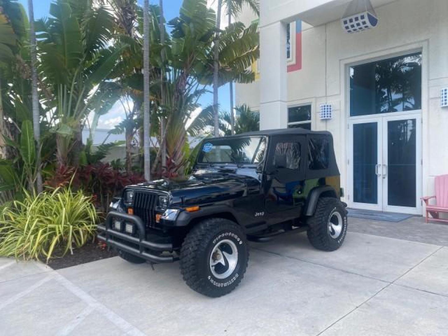 1994 Black /Gray Jeep Wrangler 4.0 6 CYL SE LOW MILES 87,813 (1J4FY29S8RP) with an 4.0L Straight 6-Cyl Engine engine, Automatic transmission, located at 4701 North Dixie Hwy, Pompano Beach, FL, 33064, (954) 422-2889, 26.240938, -80.123474 - OUR WEBPAGE FLORIDACARS1.COM HAS OVER 100 PHOTOS AND FREE CARFAX LINK 1994 JEEP WRANGLER SE AUTO AC BRAND NEW TOP WITH HARDWARE $ 2000 VALUE INCLUDED VIN: 1J4FY29S8RP433289 1 J 4 F Y 2 9 S 8 R P 4 3 3 2 8 9 UTILITY (BLAZER, JIMMY, SCOUT, ETC.) 4.0L I6 F GASOLINE REAR WHEEL DRIVE W/ 4X4 Features ABS - Photo#28
