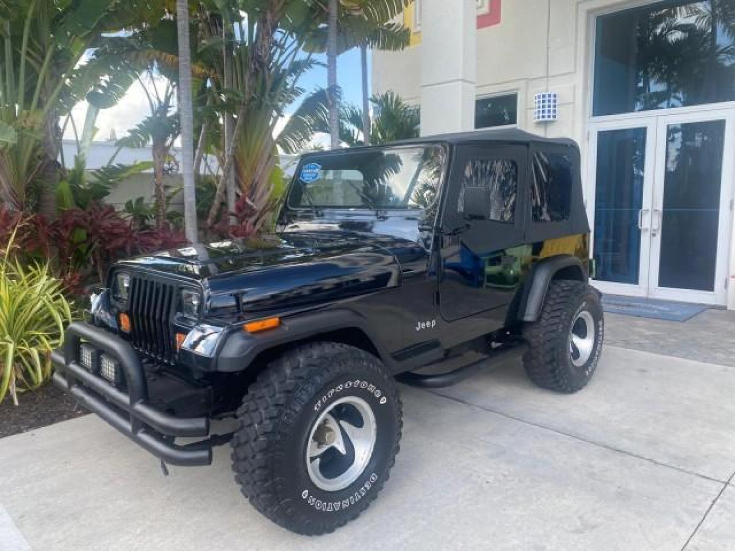 1994 Black /Gray Jeep Wrangler 4.0 6 CYL SE LOW MILES 87,813 (1J4FY29S8RP) with an 4.0L Straight 6-Cyl Engine engine, Automatic transmission, located at 4701 North Dixie Hwy, Pompano Beach, FL, 33064, (954) 422-2889, 26.240938, -80.123474 - OUR WEBPAGE FLORIDACARS1.COM HAS OVER 100 PHOTOS AND FREE CARFAX LINK 1994 JEEP WRANGLER SE AUTO AC BRAND NEW TOP WITH HARDWARE $ 2000 VALUE INCLUDED VIN: 1J4FY29S8RP433289 1 J 4 F Y 2 9 S 8 R P 4 3 3 2 8 9 UTILITY (BLAZER, JIMMY, SCOUT, ETC.) 4.0L I6 F GASOLINE REAR WHEEL DRIVE W/ 4X4 Features ABS - Photo#29