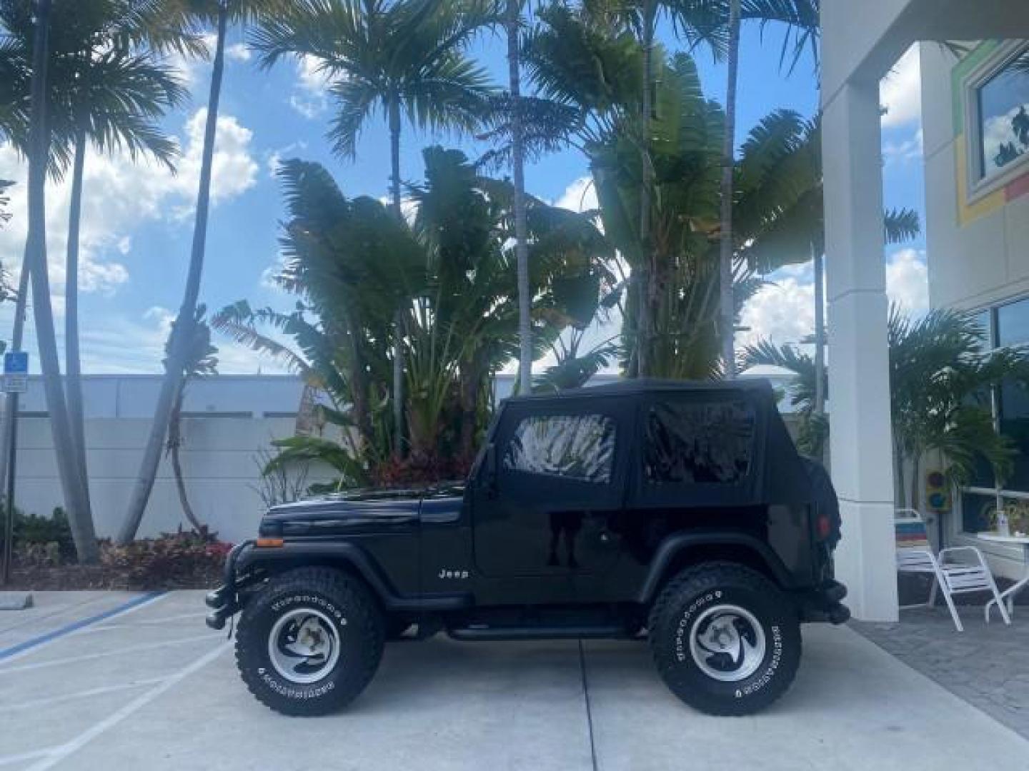1994 Black /Gray Jeep Wrangler 4.0 6 CYL SE LOW MILES 87,813 (1J4FY29S8RP) with an 4.0L Straight 6-Cyl Engine engine, Automatic transmission, located at 4701 North Dixie Hwy, Pompano Beach, FL, 33064, (954) 422-2889, 26.240938, -80.123474 - OUR WEBPAGE FLORIDACARS1.COM HAS OVER 100 PHOTOS AND FREE CARFAX LINK 1994 JEEP WRANGLER SE AUTO AC BRAND NEW TOP WITH HARDWARE $ 2000 VALUE INCLUDED VIN: 1J4FY29S8RP433289 1 J 4 F Y 2 9 S 8 R P 4 3 3 2 8 9 UTILITY (BLAZER, JIMMY, SCOUT, ETC.) 4.0L I6 F GASOLINE REAR WHEEL DRIVE W/ 4X4 Features ABS - Photo#30