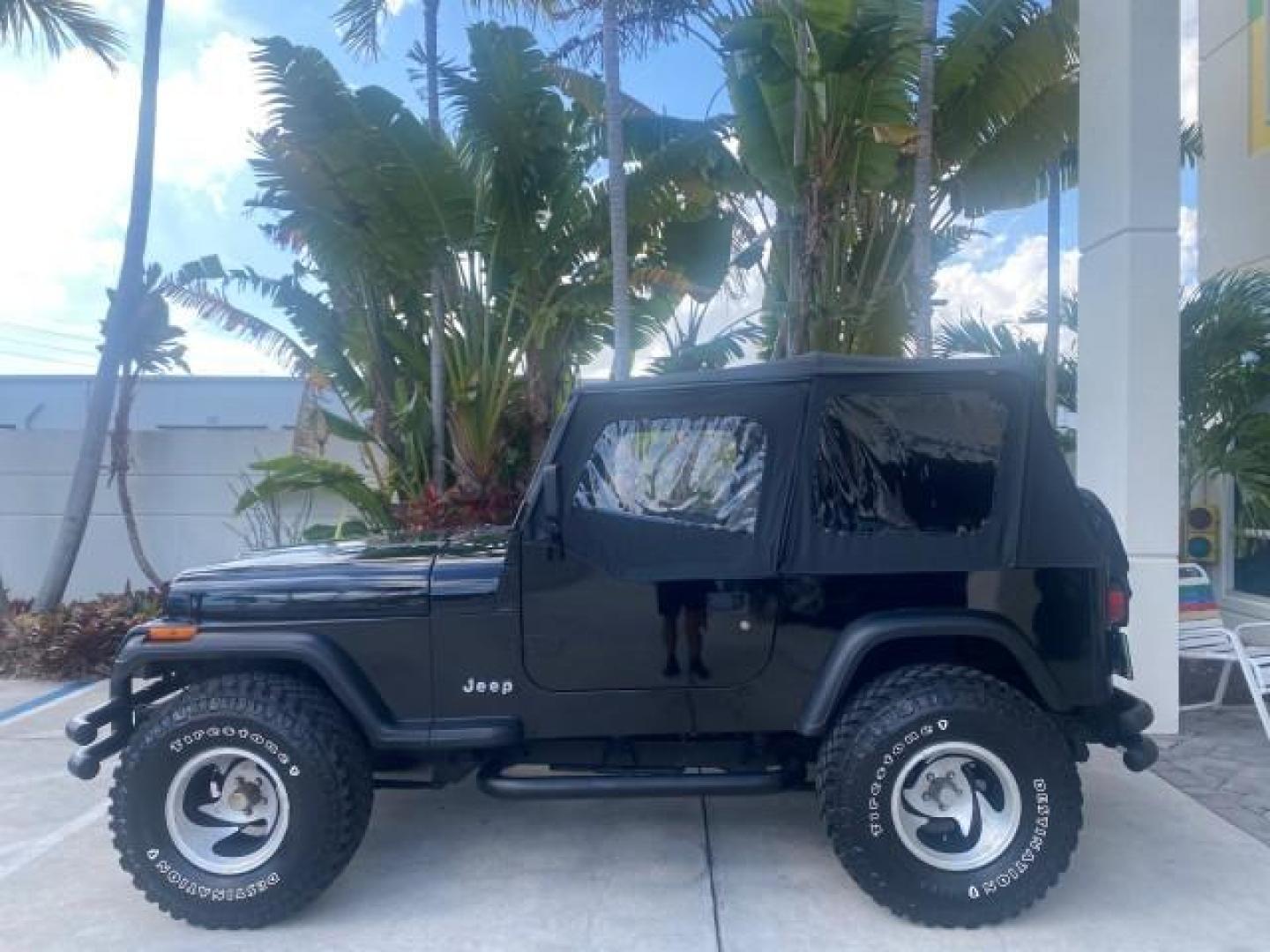 1994 Black /Gray Jeep Wrangler 4.0 6 CYL SE LOW MILES 87,813 (1J4FY29S8RP) with an 4.0L Straight 6-Cyl Engine engine, Automatic transmission, located at 4701 North Dixie Hwy, Pompano Beach, FL, 33064, (954) 422-2889, 26.240938, -80.123474 - OUR WEBPAGE FLORIDACARS1.COM HAS OVER 100 PHOTOS AND FREE CARFAX LINK 1994 JEEP WRANGLER SE AUTO AC BRAND NEW TOP WITH HARDWARE $ 2000 VALUE INCLUDED VIN: 1J4FY29S8RP433289 1 J 4 F Y 2 9 S 8 R P 4 3 3 2 8 9 UTILITY (BLAZER, JIMMY, SCOUT, ETC.) 4.0L I6 F GASOLINE REAR WHEEL DRIVE W/ 4X4 Features ABS - Photo#31