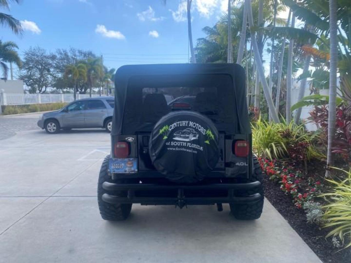 1994 Black /Gray Jeep Wrangler 4.0 6 CYL SE LOW MILES 87,813 (1J4FY29S8RP) with an 4.0L Straight 6-Cyl Engine engine, Automatic transmission, located at 4701 North Dixie Hwy, Pompano Beach, FL, 33064, (954) 422-2889, 26.240938, -80.123474 - OUR WEBPAGE FLORIDACARS1.COM HAS OVER 100 PHOTOS AND FREE CARFAX LINK 1994 JEEP WRANGLER SE AUTO AC BRAND NEW TOP WITH HARDWARE $ 2000 VALUE INCLUDED VIN: 1J4FY29S8RP433289 1 J 4 F Y 2 9 S 8 R P 4 3 3 2 8 9 UTILITY (BLAZER, JIMMY, SCOUT, ETC.) 4.0L I6 F GASOLINE REAR WHEEL DRIVE W/ 4X4 Features ABS - Photo#34