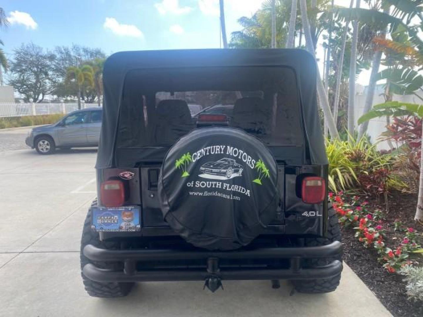 1994 Black /Gray Jeep Wrangler 4.0 6 CYL SE LOW MILES 87,813 (1J4FY29S8RP) with an 4.0L Straight 6-Cyl Engine engine, Automatic transmission, located at 4701 North Dixie Hwy, Pompano Beach, FL, 33064, (954) 422-2889, 26.240938, -80.123474 - OUR WEBPAGE FLORIDACARS1.COM HAS OVER 100 PHOTOS AND FREE CARFAX LINK 1994 JEEP WRANGLER SE AUTO AC BRAND NEW TOP WITH HARDWARE $ 2000 VALUE INCLUDED VIN: 1J4FY29S8RP433289 1 J 4 F Y 2 9 S 8 R P 4 3 3 2 8 9 UTILITY (BLAZER, JIMMY, SCOUT, ETC.) 4.0L I6 F GASOLINE REAR WHEEL DRIVE W/ 4X4 Features ABS - Photo#36