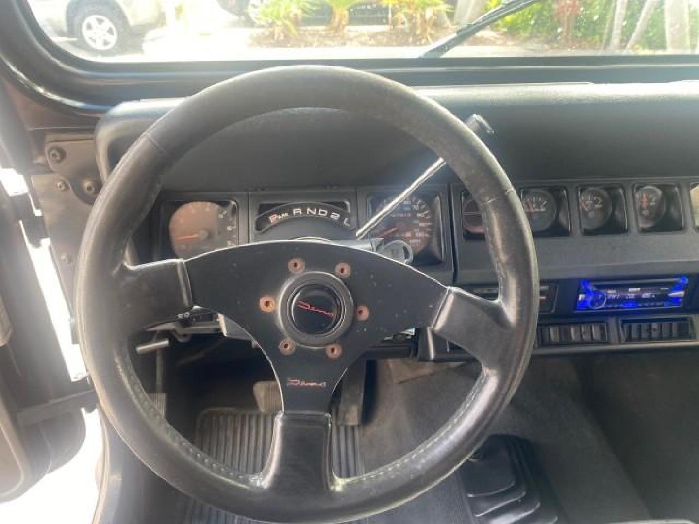 1994 Black /Gray Jeep Wrangler 4.0 6 CYL SE LOW MILES 87,813 (1J4FY29S8RP) with an 4.0L Straight 6-Cyl Engine engine, Automatic transmission, located at 4701 North Dixie Hwy, Pompano Beach, FL, 33064, (954) 422-2889, 26.240938, -80.123474 - OUR WEBPAGE FLORIDACARS1.COM HAS OVER 100 PHOTOS AND FREE CARFAX LINK 1994 JEEP WRANGLER SE AUTO AC BRAND NEW TOP WITH HARDWARE $ 2000 VALUE INCLUDED VIN: 1J4FY29S8RP433289 1 J 4 F Y 2 9 S 8 R P 4 3 3 2 8 9 UTILITY (BLAZER, JIMMY, SCOUT, ETC.) 4.0L I6 F GASOLINE REAR WHEEL DRIVE W/ 4X4 Features ABS - Photo#54