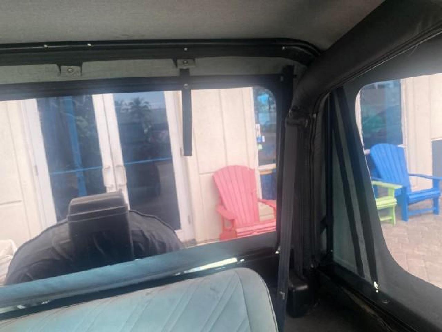 1994 Black /Gray Jeep Wrangler 4.0 6 CYL SE LOW MILES 87,813 (1J4FY29S8RP) with an 4.0L Straight 6-Cyl Engine engine, Automatic transmission, located at 4701 North Dixie Hwy, Pompano Beach, FL, 33064, (954) 422-2889, 26.240938, -80.123474 - OUR WEBPAGE FLORIDACARS1.COM HAS OVER 100 PHOTOS AND FREE CARFAX LINK 1994 JEEP WRANGLER SE AUTO AC BRAND NEW TOP WITH HARDWARE $ 2000 VALUE INCLUDED VIN: 1J4FY29S8RP433289 1 J 4 F Y 2 9 S 8 R P 4 3 3 2 8 9 UTILITY (BLAZER, JIMMY, SCOUT, ETC.) 4.0L I6 F GASOLINE REAR WHEEL DRIVE W/ 4X4 Features ABS - Photo#76