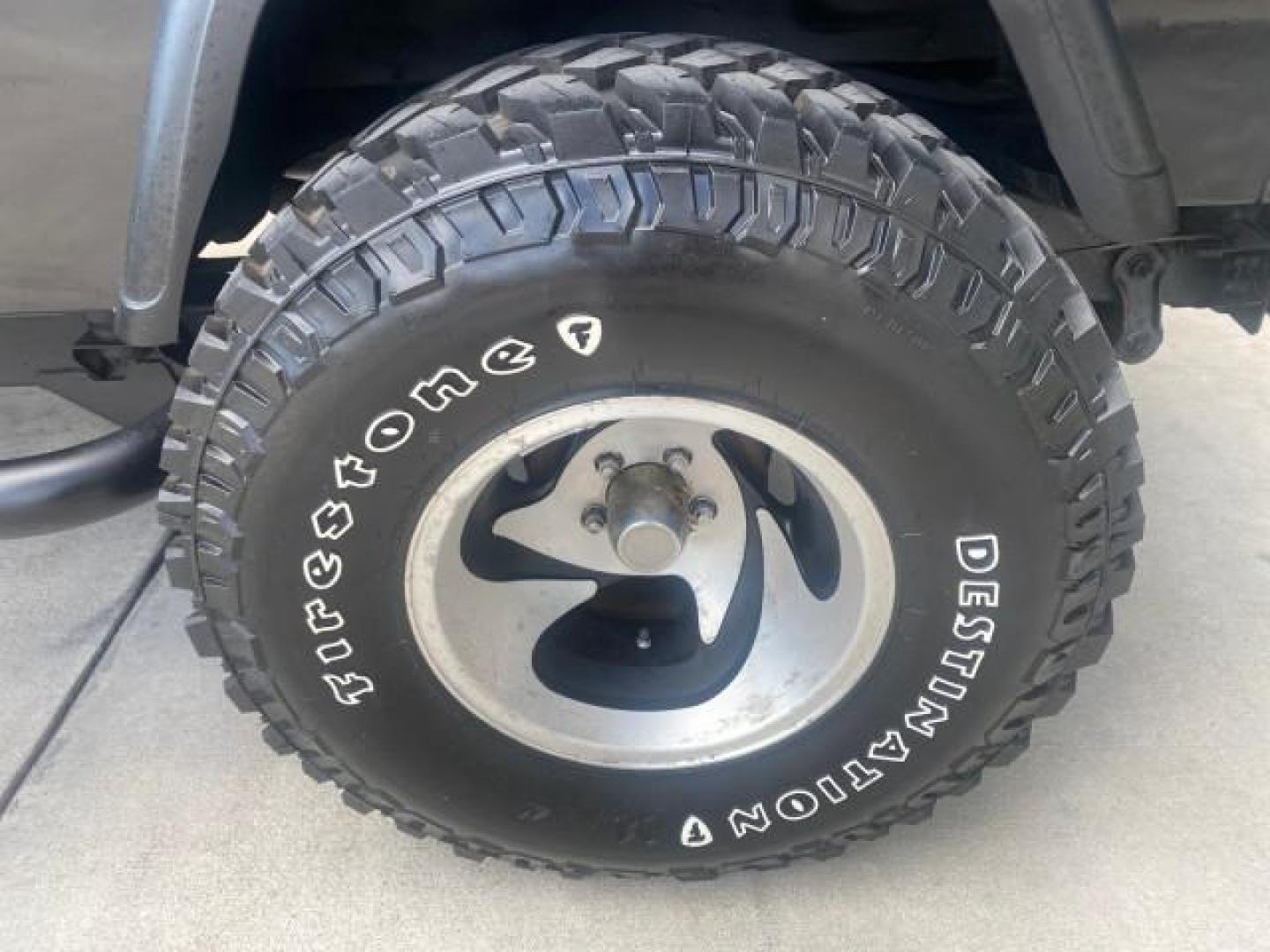 1994 Black /Gray Jeep Wrangler 4.0 6 CYL SE LOW MILES 87,813 (1J4FY29S8RP) with an 4.0L Straight 6-Cyl Engine engine, Automatic transmission, located at 4701 North Dixie Hwy, Pompano Beach, FL, 33064, (954) 422-2889, 26.240938, -80.123474 - OUR WEBPAGE FLORIDACARS1.COM HAS OVER 100 PHOTOS AND FREE CARFAX LINK 1994 JEEP WRANGLER SE AUTO AC BRAND NEW TOP WITH HARDWARE $ 2000 VALUE INCLUDED VIN: 1J4FY29S8RP433289 1 J 4 F Y 2 9 S 8 R P 4 3 3 2 8 9 UTILITY (BLAZER, JIMMY, SCOUT, ETC.) 4.0L I6 F GASOLINE REAR WHEEL DRIVE W/ 4X4 Features ABS - Photo#81