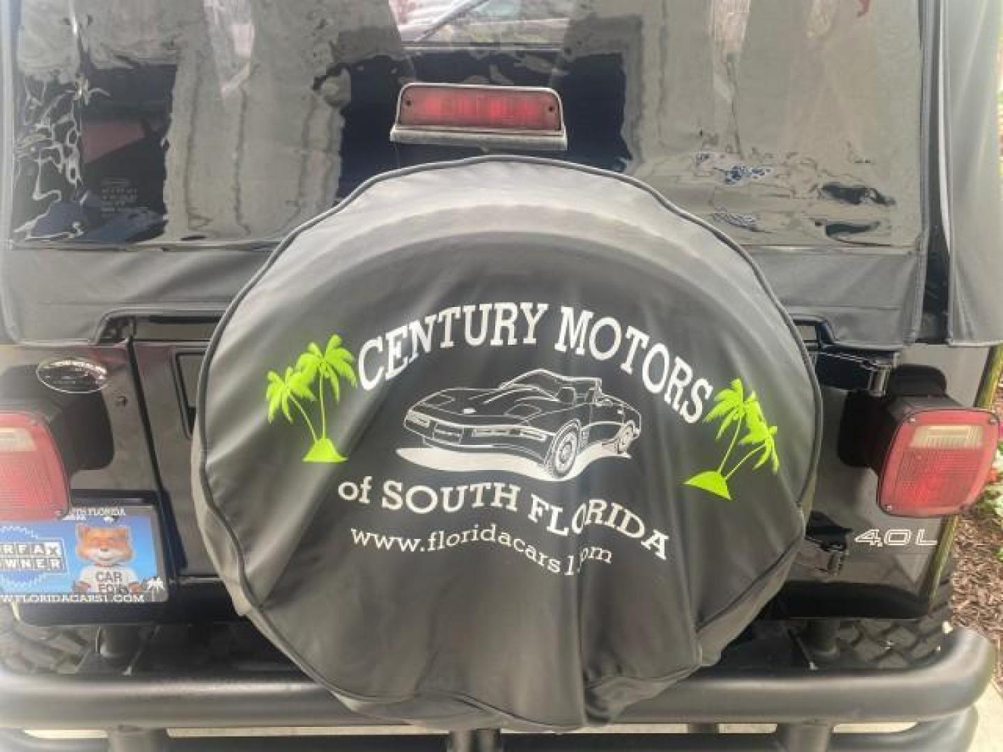 1994 Black /Gray Jeep Wrangler 4.0 6 CYL SE LOW MILES 87,813 (1J4FY29S8RP) with an 4.0L Straight 6-Cyl Engine engine, Automatic transmission, located at 4701 North Dixie Hwy, Pompano Beach, FL, 33064, (954) 422-2889, 26.240938, -80.123474 - OUR WEBPAGE FLORIDACARS1.COM HAS OVER 100 PHOTOS AND FREE CARFAX LINK 1994 JEEP WRANGLER SE AUTO AC BRAND NEW TOP WITH HARDWARE $ 2000 VALUE INCLUDED VIN: 1J4FY29S8RP433289 1 J 4 F Y 2 9 S 8 R P 4 3 3 2 8 9 UTILITY (BLAZER, JIMMY, SCOUT, ETC.) 4.0L I6 F GASOLINE REAR WHEEL DRIVE W/ 4X4 Features ABS - Photo#86