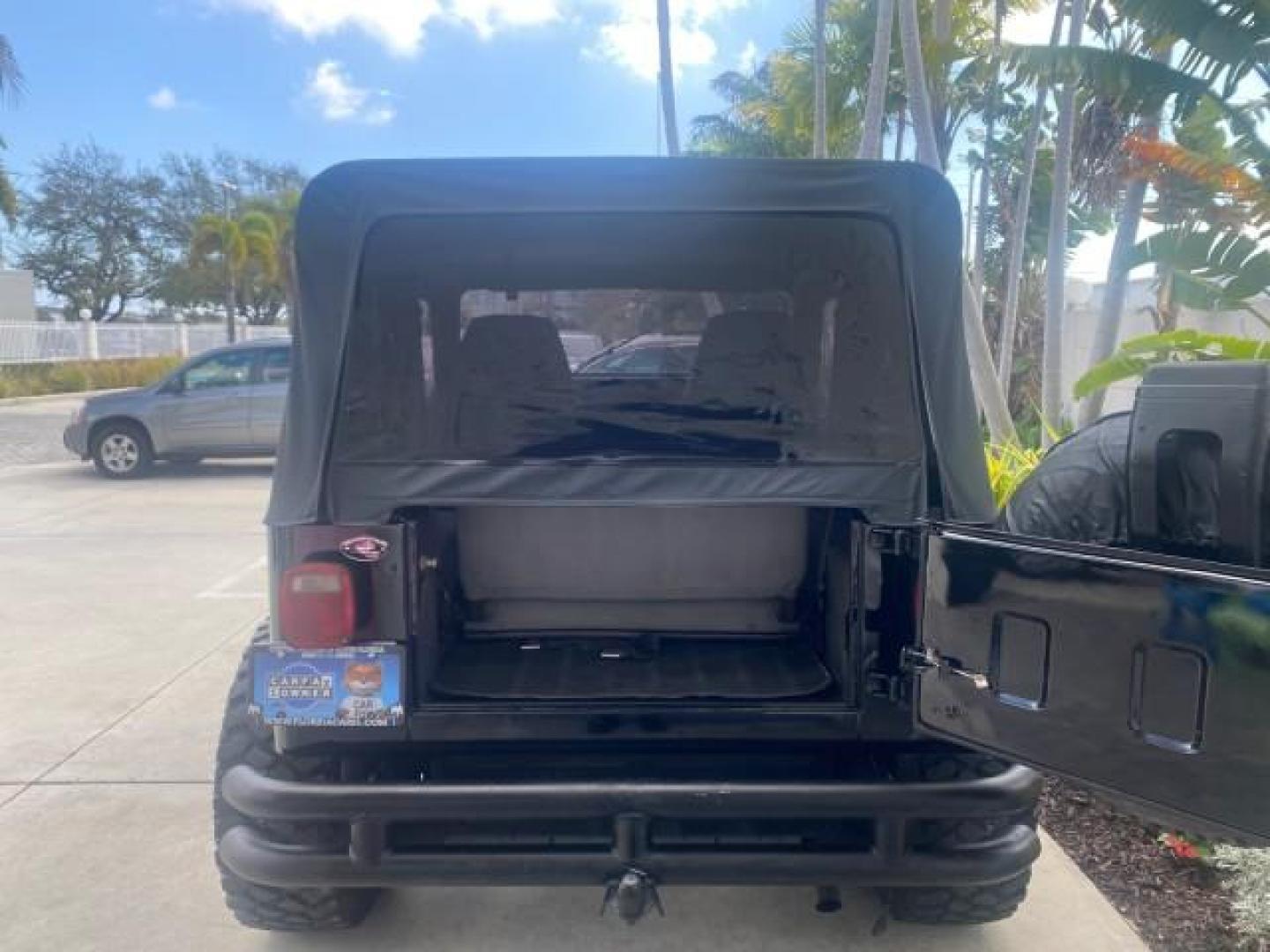 1994 Black /Gray Jeep Wrangler 4.0 6 CYL SE LOW MILES 87,813 (1J4FY29S8RP) with an 4.0L Straight 6-Cyl Engine engine, Automatic transmission, located at 4701 North Dixie Hwy, Pompano Beach, FL, 33064, (954) 422-2889, 26.240938, -80.123474 - OUR WEBPAGE FLORIDACARS1.COM HAS OVER 100 PHOTOS AND FREE CARFAX LINK 1994 JEEP WRANGLER SE AUTO AC BRAND NEW TOP WITH HARDWARE $ 2000 VALUE INCLUDED VIN: 1J4FY29S8RP433289 1 J 4 F Y 2 9 S 8 R P 4 3 3 2 8 9 UTILITY (BLAZER, JIMMY, SCOUT, ETC.) 4.0L I6 F GASOLINE REAR WHEEL DRIVE W/ 4X4 Features ABS - Photo#90