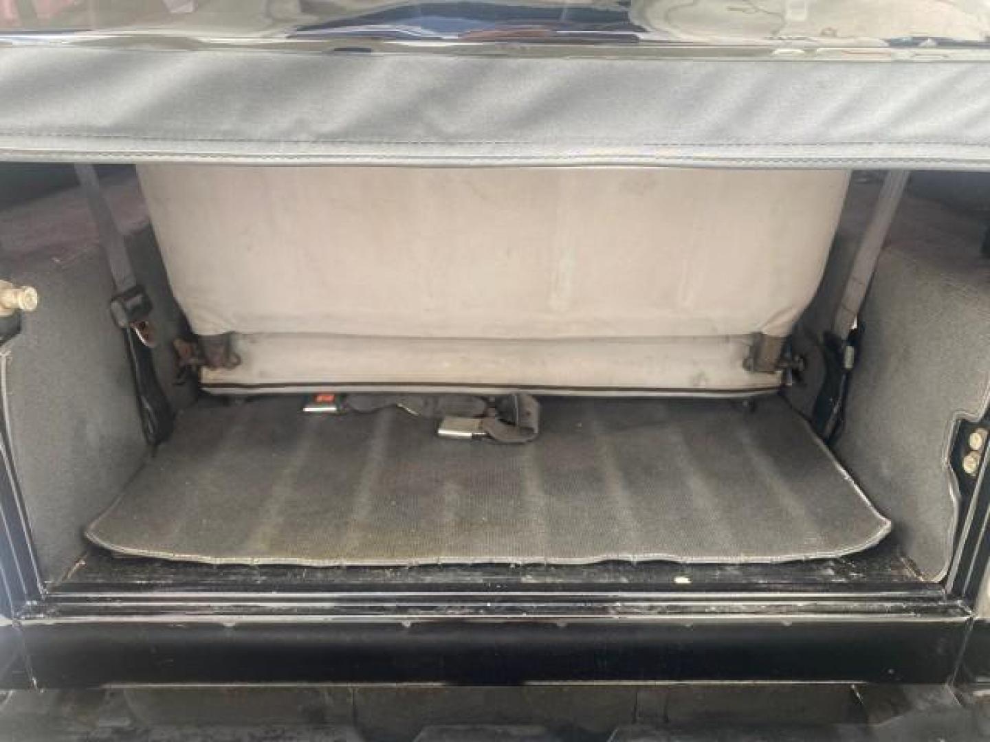 1994 Black /Gray Jeep Wrangler 4.0 6 CYL SE LOW MILES 87,813 (1J4FY29S8RP) with an 4.0L Straight 6-Cyl Engine engine, Automatic transmission, located at 4701 North Dixie Hwy, Pompano Beach, FL, 33064, (954) 422-2889, 26.240938, -80.123474 - OUR WEBPAGE FLORIDACARS1.COM HAS OVER 100 PHOTOS AND FREE CARFAX LINK 1994 JEEP WRANGLER SE AUTO AC BRAND NEW TOP WITH HARDWARE $ 2000 VALUE INCLUDED VIN: 1J4FY29S8RP433289 1 J 4 F Y 2 9 S 8 R P 4 3 3 2 8 9 UTILITY (BLAZER, JIMMY, SCOUT, ETC.) 4.0L I6 F GASOLINE REAR WHEEL DRIVE W/ 4X4 Features ABS - Photo#92