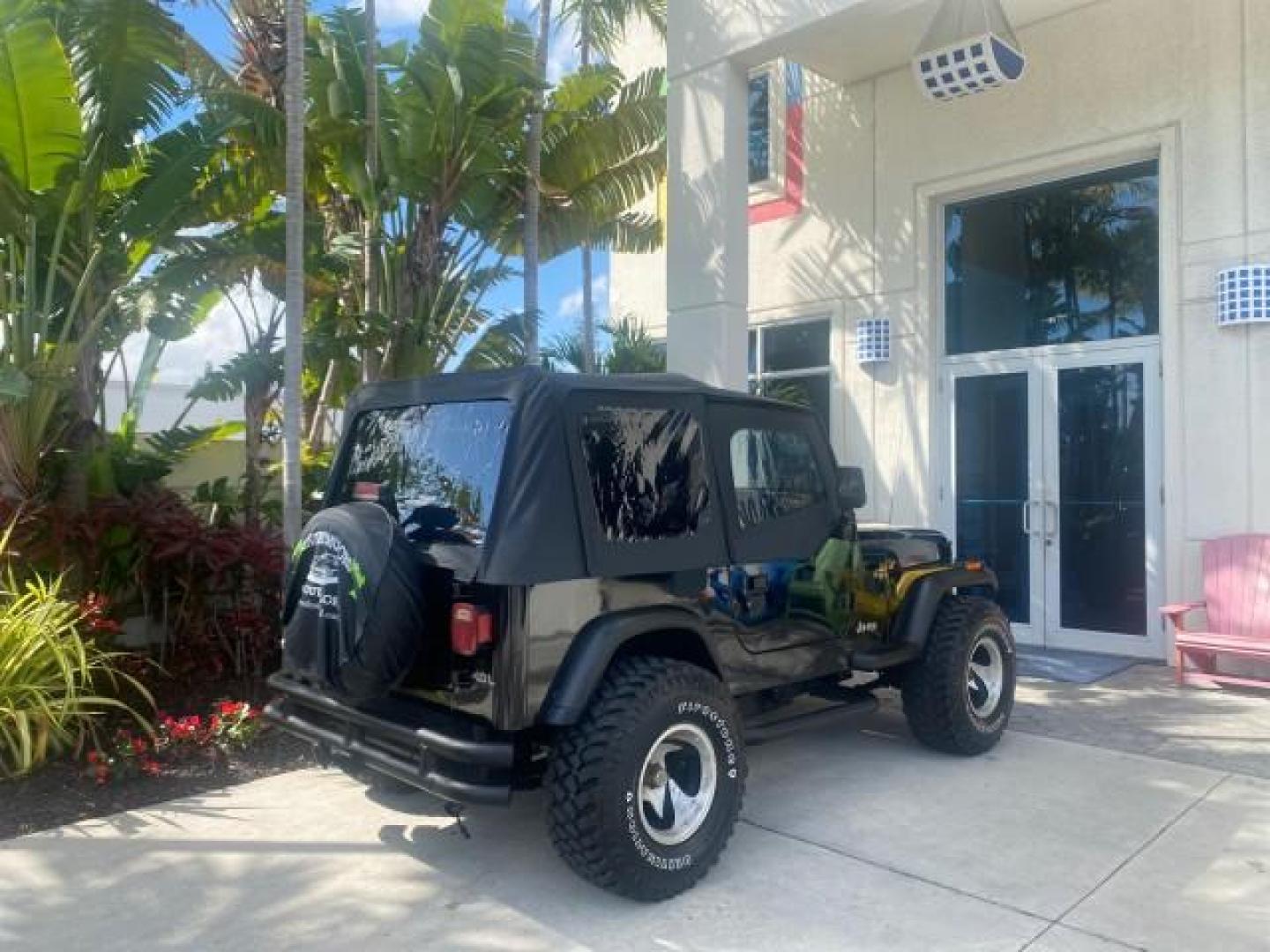 1994 Black /Gray Jeep Wrangler 4.0 6 CYL SE LOW MILES 87,813 (1J4FY29S8RP) with an 4.0L Straight 6-Cyl Engine engine, Automatic transmission, located at 4701 North Dixie Hwy, Pompano Beach, FL, 33064, (954) 422-2889, 26.240938, -80.123474 - OUR WEBPAGE FLORIDACARS1.COM HAS OVER 100 PHOTOS AND FREE CARFAX LINK 1994 JEEP WRANGLER SE AUTO AC BRAND NEW TOP WITH HARDWARE $ 2000 VALUE INCLUDED VIN: 1J4FY29S8RP433289 1 J 4 F Y 2 9 S 8 R P 4 3 3 2 8 9 UTILITY (BLAZER, JIMMY, SCOUT, ETC.) 4.0L I6 F GASOLINE REAR WHEEL DRIVE W/ 4X4 Features ABS - Photo#95