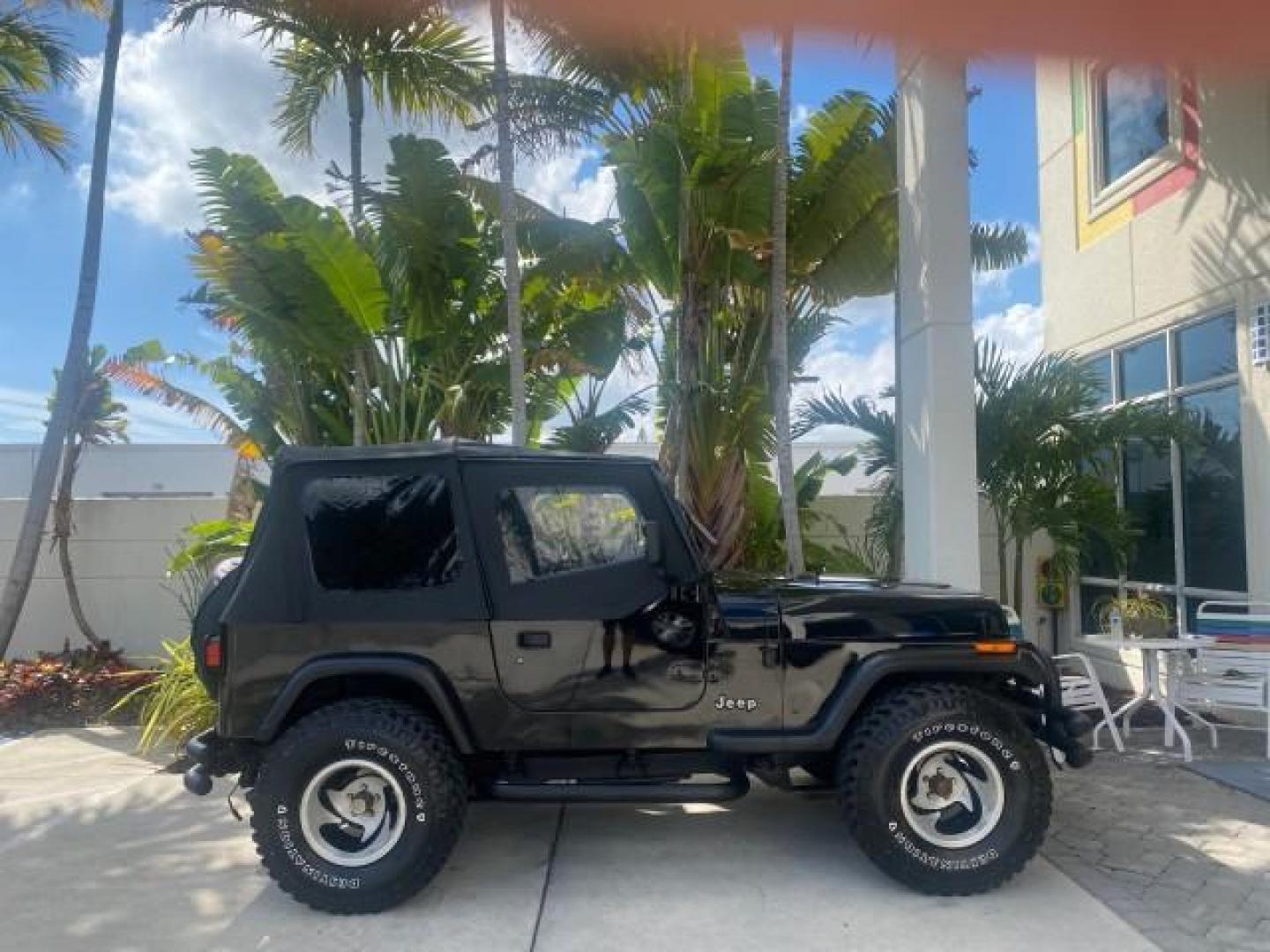 1994 Black /Gray Jeep Wrangler 4.0 6 CYL SE LOW MILES 87,813 (1J4FY29S8RP) with an 4.0L Straight 6-Cyl Engine engine, Automatic transmission, located at 4701 North Dixie Hwy, Pompano Beach, FL, 33064, (954) 422-2889, 26.240938, -80.123474 - OUR WEBPAGE FLORIDACARS1.COM HAS OVER 100 PHOTOS AND FREE CARFAX LINK 1994 JEEP WRANGLER SE AUTO AC BRAND NEW TOP WITH HARDWARE $ 2000 VALUE INCLUDED VIN: 1J4FY29S8RP433289 1 J 4 F Y 2 9 S 8 R P 4 3 3 2 8 9 UTILITY (BLAZER, JIMMY, SCOUT, ETC.) 4.0L I6 F GASOLINE REAR WHEEL DRIVE W/ 4X4 Features ABS - Photo#97