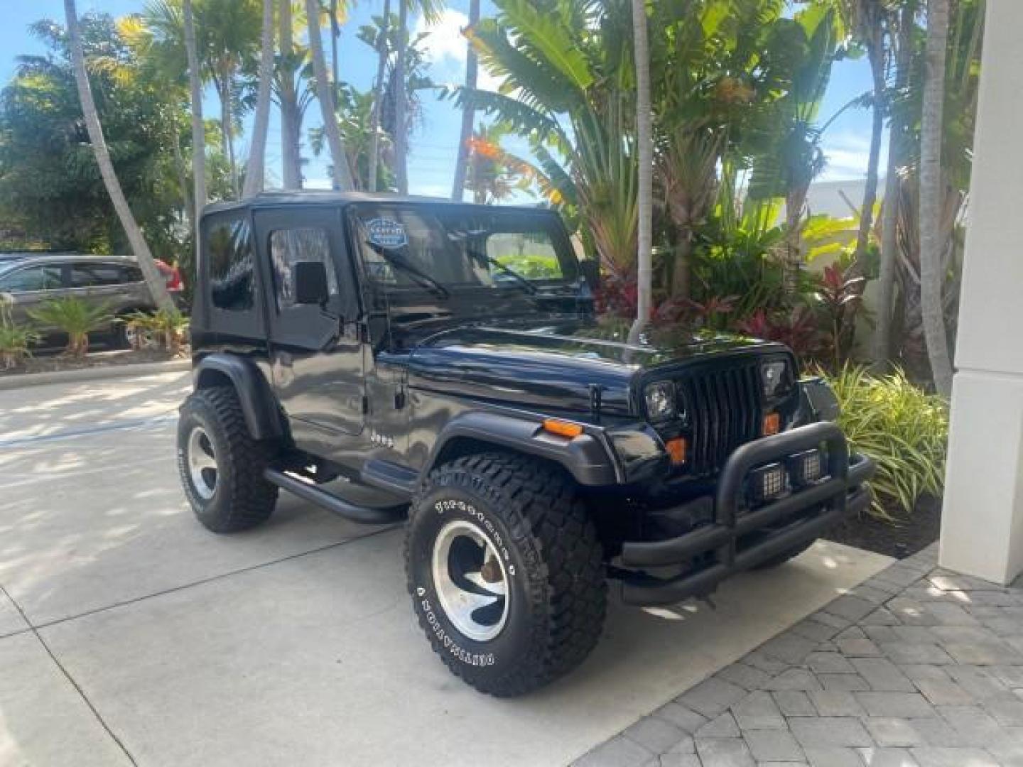 1994 Black /Gray Jeep Wrangler 4.0 6 CYL SE LOW MILES 87,813 (1J4FY29S8RP) with an 4.0L Straight 6-Cyl Engine engine, Automatic transmission, located at 4701 North Dixie Hwy, Pompano Beach, FL, 33064, (954) 422-2889, 26.240938, -80.123474 - OUR WEBPAGE FLORIDACARS1.COM HAS OVER 100 PHOTOS AND FREE CARFAX LINK 1994 JEEP WRANGLER SE AUTO AC BRAND NEW TOP WITH HARDWARE $ 2000 VALUE INCLUDED VIN: 1J4FY29S8RP433289 1 J 4 F Y 2 9 S 8 R P 4 3 3 2 8 9 UTILITY (BLAZER, JIMMY, SCOUT, ETC.) 4.0L I6 F GASOLINE REAR WHEEL DRIVE W/ 4X4 Features ABS - Photo#99