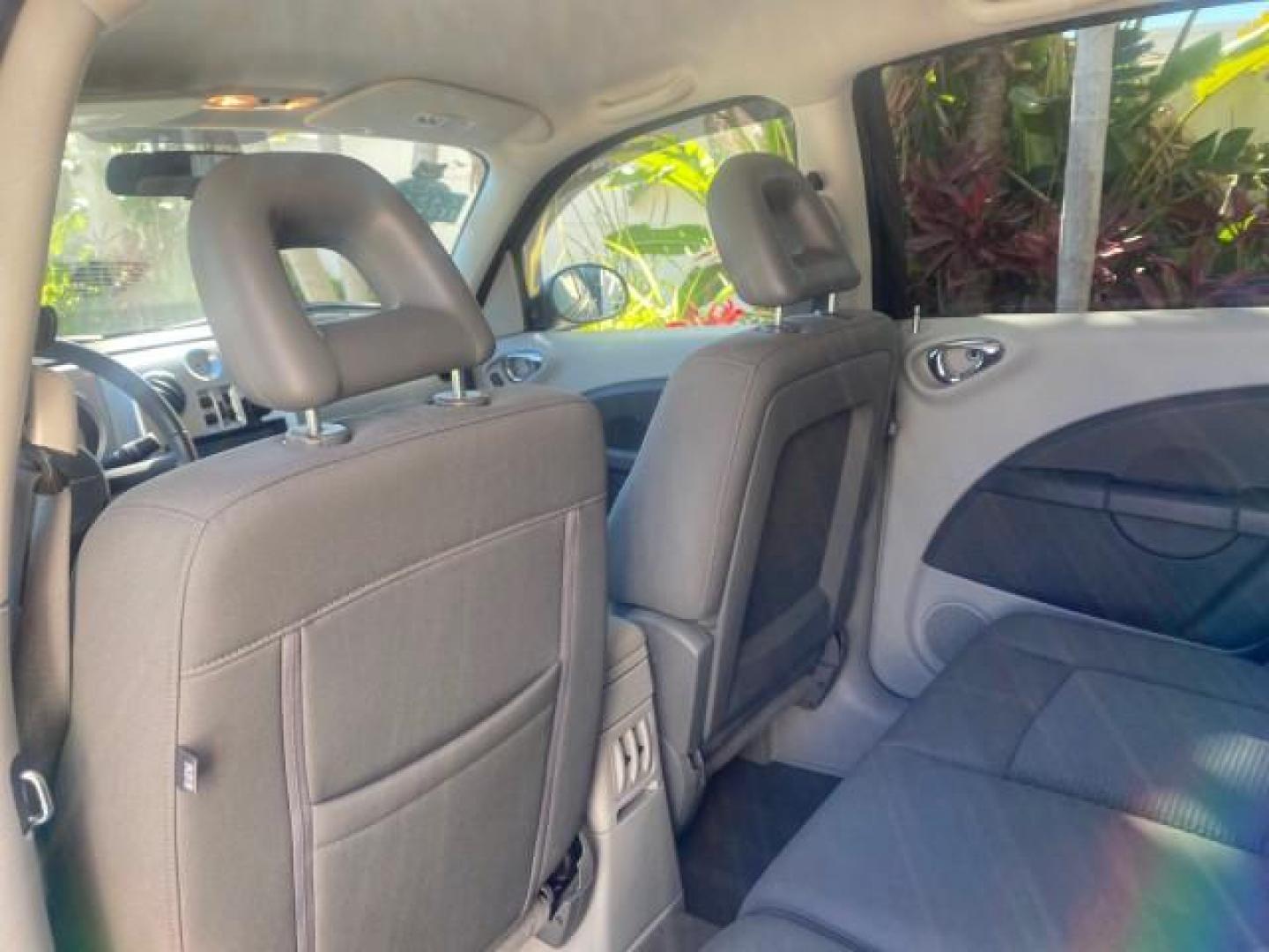 2010 Brilliant Black Pearl /Pastel slate gray Chrysler PT Cruiser Classic LOW MILES 37,988 1 OWNER (3A4GY5F91AT) with an 2.4L DOHC SMPI 16-Valve I4 Engine engine, Automatic transmission, located at 4701 North Dixie Hwy, Pompano Beach, FL, 33064, (954) 422-2889, 26.240938, -80.123474 - OUR WEBPAGE FLORIDACARS1.COM HAS OVER 100 PHOTOS AND FREE CARFAX LINK 2010 CHRYSLER PT CRUISER CLASSIC 1 OWNER VIN: 3A4GY5F91AT132886 3 A 4 G Y 5 F 9 1 A T 1 3 2 8 8 6 VAN 2.4L I4 F DOHC 16V GASOLINE 24 MPG FRONT WHEEL DRIVE Features ABS Brakes Air Conditioning Alloy Wheels AM/FM Stereo Automatic Tr - Photo#76