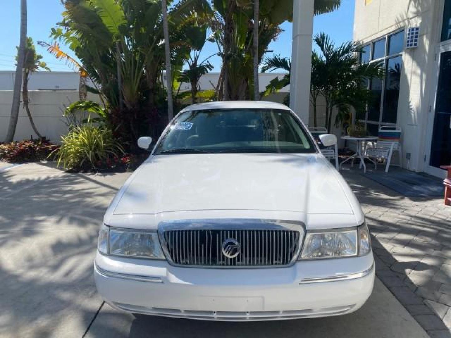 2005 Vibrant White /Medium Parchment Mercury Grand Marquis GS LOW MILES 49,348 (2MEFM74W85X) with an 4.6L OHC SEFI V8 Engine engine, Automatic transmission, located at 4701 North Dixie Hwy, Pompano Beach, FL, 33064, (954) 422-2889, 26.240938, -80.123474 - OUR WEBPAGE FLORIDACARS1.COM HAS OVER 100 PHOTOS AND FREE CARFAX LINK 2005 MERCURY GRAND MARQUIS GS VIN: 2MEFM74W85X603873 2 M E F M 7 4 W 8 5 X 6 0 3 8 7 3 SEDAN 4 DR 4.6L V8 F DOHC GASOLINE 25 MPG REAR WHEEL DRIVE Features ABS Brakes Air Conditioning AM/FM Stereo Automatic Transmission CD Audio Cl- Photo#2