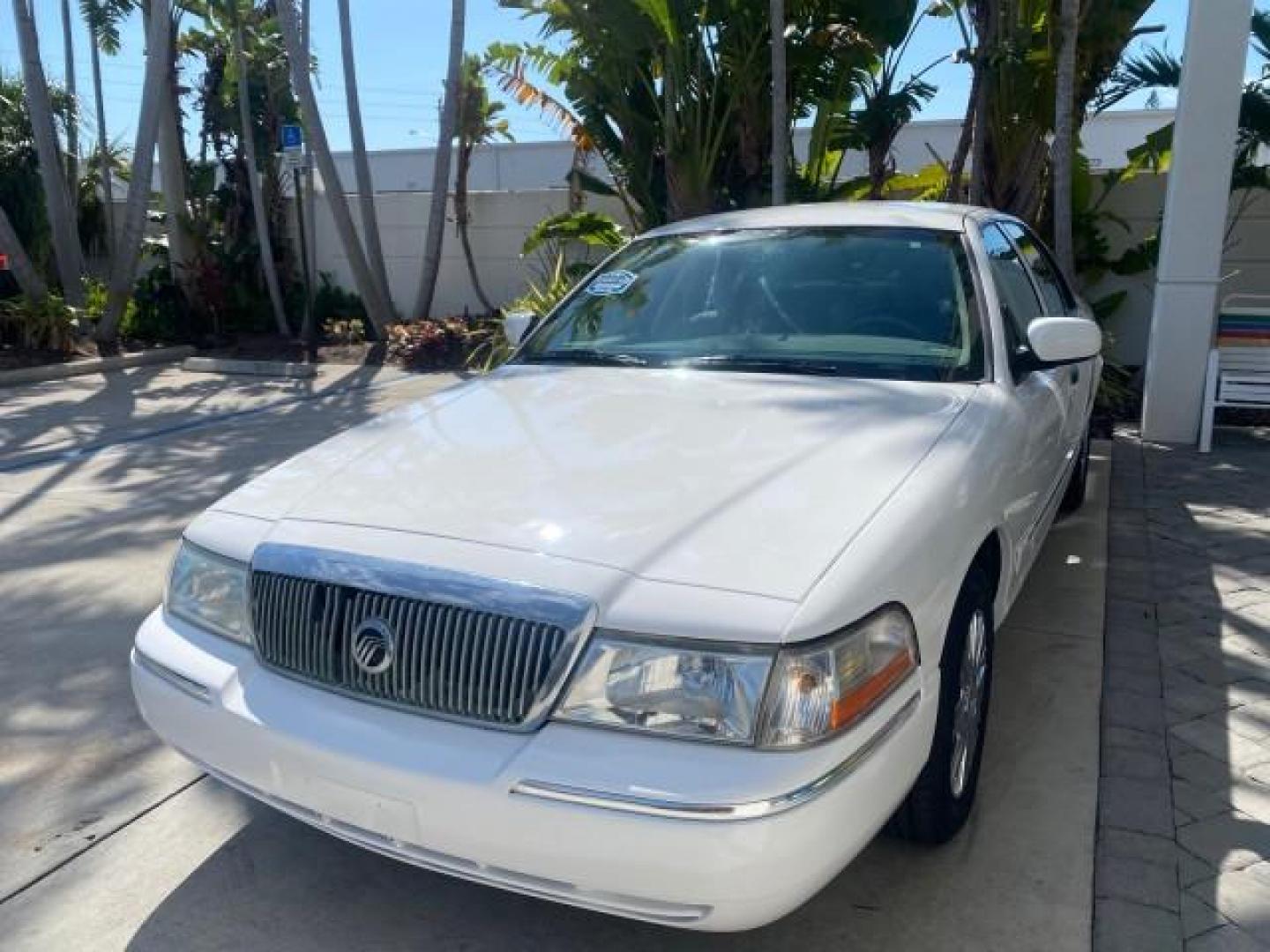 2005 Vibrant White /Medium Parchment Mercury Grand Marquis GS LOW MILES 49,348 (2MEFM74W85X) with an 4.6L OHC SEFI V8 Engine engine, Automatic transmission, located at 4701 North Dixie Hwy, Pompano Beach, FL, 33064, (954) 422-2889, 26.240938, -80.123474 - OUR WEBPAGE FLORIDACARS1.COM HAS OVER 100 PHOTOS AND FREE CARFAX LINK 2005 MERCURY GRAND MARQUIS GS VIN: 2MEFM74W85X603873 2 M E F M 7 4 W 8 5 X 6 0 3 8 7 3 SEDAN 4 DR 4.6L V8 F DOHC GASOLINE 25 MPG REAR WHEEL DRIVE Features ABS Brakes Air Conditioning AM/FM Stereo Automatic Transmission CD Audio Cl- Photo#3