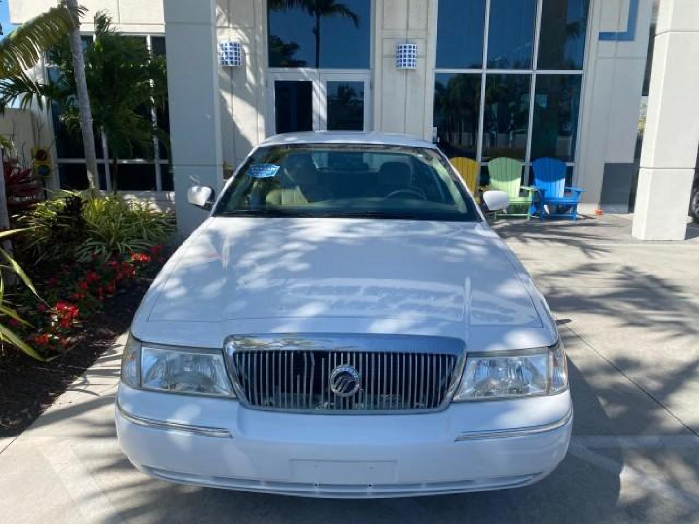 2005 Vibrant White /Medium Parchment Mercury Grand Marquis GS LOW MILES 49,348 (2MEFM74W85X) with an 4.6L OHC SEFI V8 Engine engine, Automatic transmission, located at 4701 North Dixie Hwy, Pompano Beach, FL, 33064, (954) 422-2889, 26.240938, -80.123474 - OUR WEBPAGE FLORIDACARS1.COM HAS OVER 100 PHOTOS AND FREE CARFAX LINK 2005 MERCURY GRAND MARQUIS GS VIN: 2MEFM74W85X603873 2 M E F M 7 4 W 8 5 X 6 0 3 8 7 3 SEDAN 4 DR 4.6L V8 F DOHC GASOLINE 25 MPG REAR WHEEL DRIVE Features ABS Brakes Air Conditioning AM/FM Stereo Automatic Transmission CD Audio Cl- Photo#27