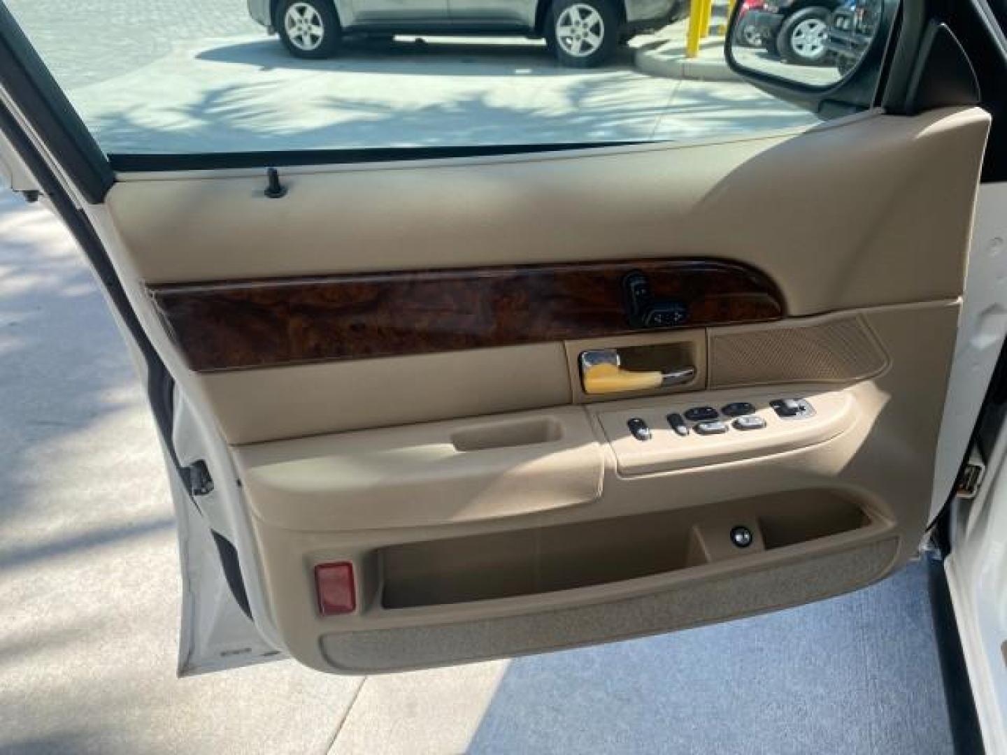 2005 Vibrant White /Medium Parchment Mercury Grand Marquis GS LOW MILES 49,348 (2MEFM74W85X) with an 4.6L OHC SEFI V8 Engine engine, Automatic transmission, located at 4701 North Dixie Hwy, Pompano Beach, FL, 33064, (954) 422-2889, 26.240938, -80.123474 - OUR WEBPAGE FLORIDACARS1.COM HAS OVER 100 PHOTOS AND FREE CARFAX LINK 2005 MERCURY GRAND MARQUIS GS VIN: 2MEFM74W85X603873 2 M E F M 7 4 W 8 5 X 6 0 3 8 7 3 SEDAN 4 DR 4.6L V8 F DOHC GASOLINE 25 MPG REAR WHEEL DRIVE Features ABS Brakes Air Conditioning AM/FM Stereo Automatic Transmission CD Audio Cl- Photo#41