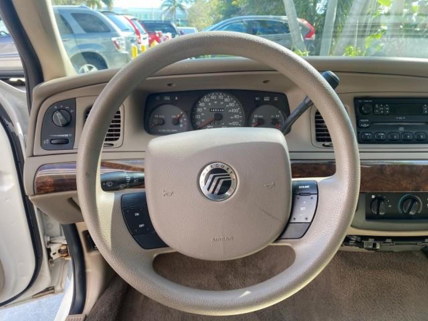 2005 Vibrant White /Medium Parchment Mercury Grand Marquis GS LOW MILES 49,348 (2MEFM74W85X) with an 4.6L OHC SEFI V8 Engine engine, Automatic transmission, located at 4701 North Dixie Hwy, Pompano Beach, FL, 33064, (954) 422-2889, 26.240938, -80.123474 - OUR WEBPAGE FLORIDACARS1.COM HAS OVER 100 PHOTOS AND FREE CARFAX LINK 2005 MERCURY GRAND MARQUIS GS VIN: 2MEFM74W85X603873 2 M E F M 7 4 W 8 5 X 6 0 3 8 7 3 SEDAN 4 DR 4.6L V8 F DOHC GASOLINE 25 MPG REAR WHEEL DRIVE Features ABS Brakes Air Conditioning AM/FM Stereo Automatic Transmission CD Audio Cl- Photo#47