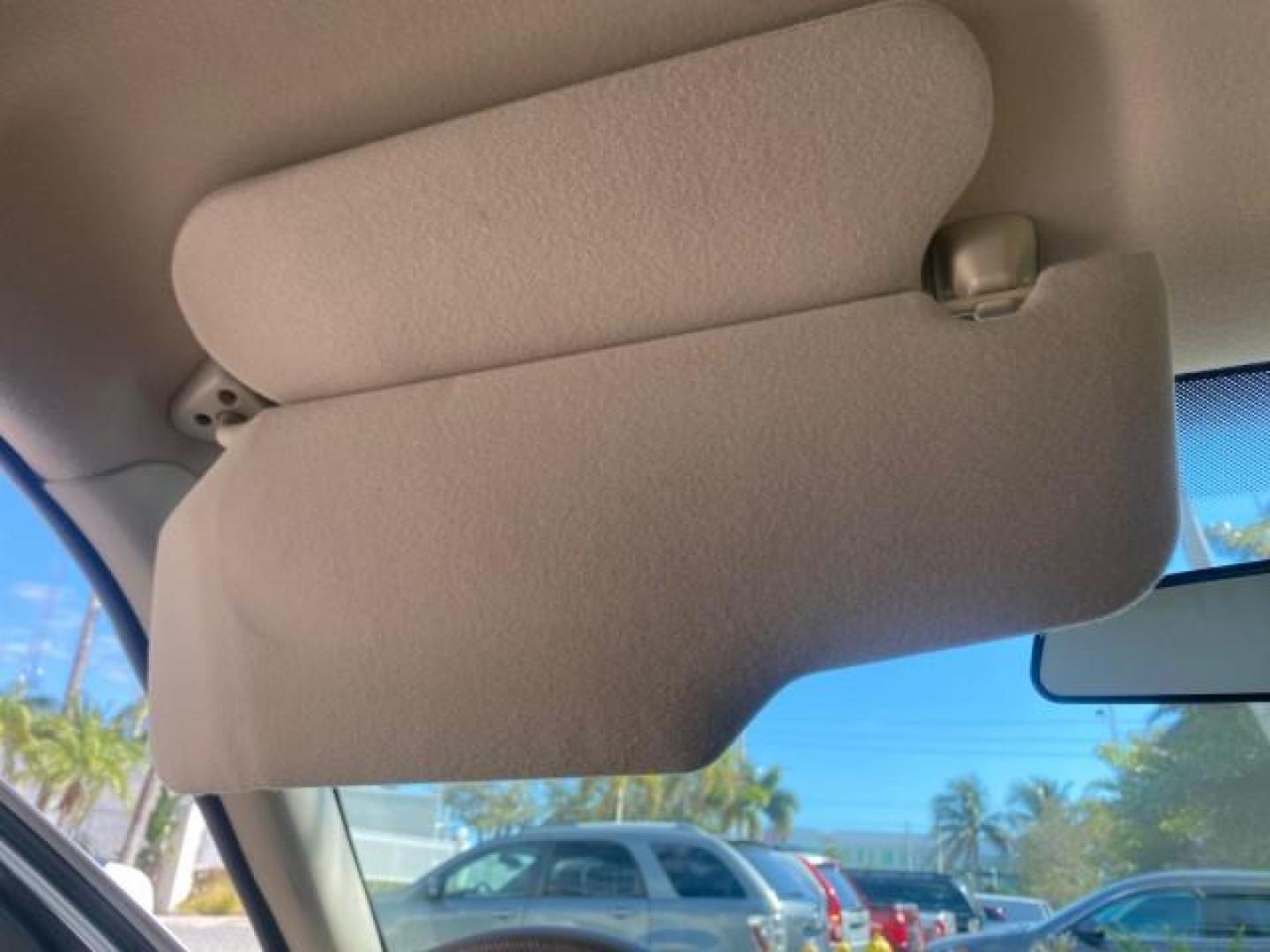 2005 Vibrant White /Medium Parchment Mercury Grand Marquis GS LOW MILES 49,348 (2MEFM74W85X) with an 4.6L OHC SEFI V8 Engine engine, Automatic transmission, located at 4701 North Dixie Hwy, Pompano Beach, FL, 33064, (954) 422-2889, 26.240938, -80.123474 - OUR WEBPAGE FLORIDACARS1.COM HAS OVER 100 PHOTOS AND FREE CARFAX LINK 2005 MERCURY GRAND MARQUIS GS VIN: 2MEFM74W85X603873 2 M E F M 7 4 W 8 5 X 6 0 3 8 7 3 SEDAN 4 DR 4.6L V8 F DOHC GASOLINE 25 MPG REAR WHEEL DRIVE Features ABS Brakes Air Conditioning AM/FM Stereo Automatic Transmission CD Audio Cl- Photo#60