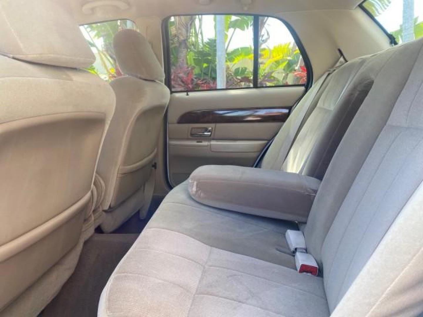 2005 Vibrant White /Medium Parchment Mercury Grand Marquis GS LOW MILES 49,348 (2MEFM74W85X) with an 4.6L OHC SEFI V8 Engine engine, Automatic transmission, located at 4701 North Dixie Hwy, Pompano Beach, FL, 33064, (954) 422-2889, 26.240938, -80.123474 - OUR WEBPAGE FLORIDACARS1.COM HAS OVER 100 PHOTOS AND FREE CARFAX LINK 2005 MERCURY GRAND MARQUIS GS VIN: 2MEFM74W85X603873 2 M E F M 7 4 W 8 5 X 6 0 3 8 7 3 SEDAN 4 DR 4.6L V8 F DOHC GASOLINE 25 MPG REAR WHEEL DRIVE Features ABS Brakes Air Conditioning AM/FM Stereo Automatic Transmission CD Audio Cl- Photo#68