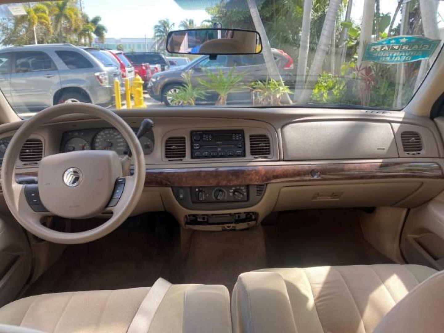 2005 Vibrant White /Medium Parchment Mercury Grand Marquis GS LOW MILES 49,348 (2MEFM74W85X) with an 4.6L OHC SEFI V8 Engine engine, Automatic transmission, located at 4701 North Dixie Hwy, Pompano Beach, FL, 33064, (954) 422-2889, 26.240938, -80.123474 - OUR WEBPAGE FLORIDACARS1.COM HAS OVER 100 PHOTOS AND FREE CARFAX LINK 2005 MERCURY GRAND MARQUIS GS VIN: 2MEFM74W85X603873 2 M E F M 7 4 W 8 5 X 6 0 3 8 7 3 SEDAN 4 DR 4.6L V8 F DOHC GASOLINE 25 MPG REAR WHEEL DRIVE Features ABS Brakes Air Conditioning AM/FM Stereo Automatic Transmission CD Audio Cl- Photo#72