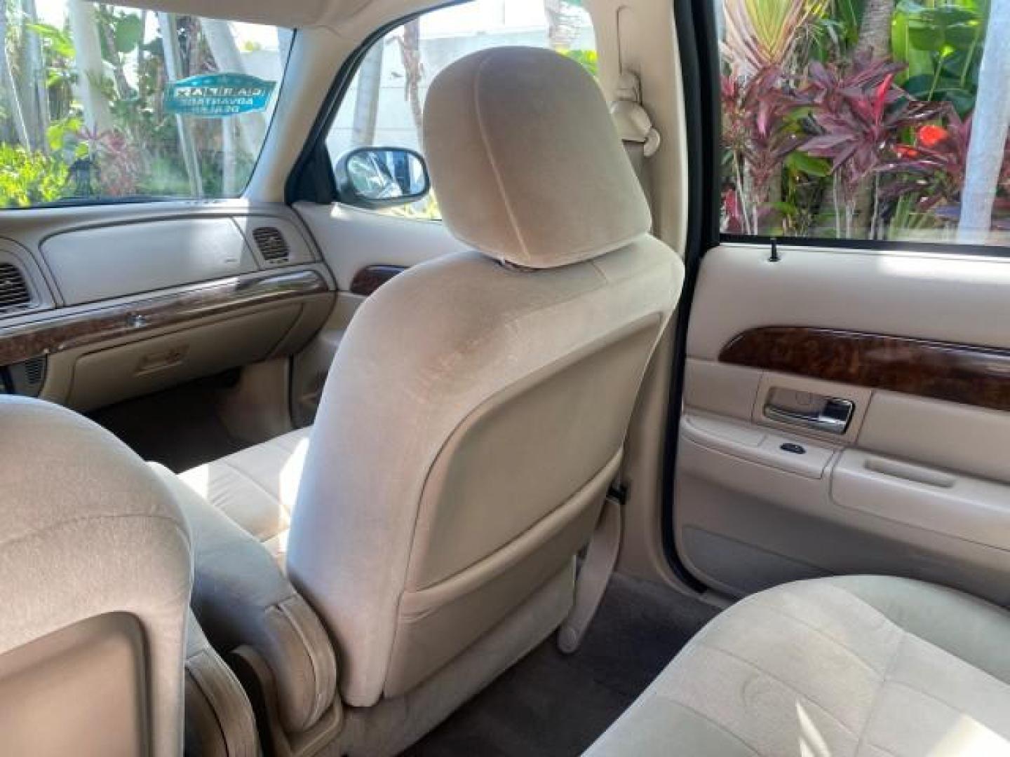 2005 Vibrant White /Medium Parchment Mercury Grand Marquis GS LOW MILES 49,348 (2MEFM74W85X) with an 4.6L OHC SEFI V8 Engine engine, Automatic transmission, located at 4701 North Dixie Hwy, Pompano Beach, FL, 33064, (954) 422-2889, 26.240938, -80.123474 - OUR WEBPAGE FLORIDACARS1.COM HAS OVER 100 PHOTOS AND FREE CARFAX LINK 2005 MERCURY GRAND MARQUIS GS VIN: 2MEFM74W85X603873 2 M E F M 7 4 W 8 5 X 6 0 3 8 7 3 SEDAN 4 DR 4.6L V8 F DOHC GASOLINE 25 MPG REAR WHEEL DRIVE Features ABS Brakes Air Conditioning AM/FM Stereo Automatic Transmission CD Audio Cl- Photo#73