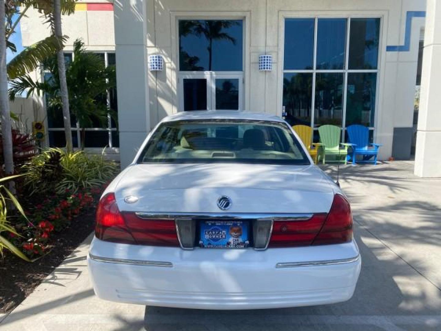 2005 Vibrant White /Medium Parchment Mercury Grand Marquis GS LOW MILES 49,348 (2MEFM74W85X) with an 4.6L OHC SEFI V8 Engine engine, Automatic transmission, located at 4701 North Dixie Hwy, Pompano Beach, FL, 33064, (954) 422-2889, 26.240938, -80.123474 - OUR WEBPAGE FLORIDACARS1.COM HAS OVER 100 PHOTOS AND FREE CARFAX LINK 2005 MERCURY GRAND MARQUIS GS VIN: 2MEFM74W85X603873 2 M E F M 7 4 W 8 5 X 6 0 3 8 7 3 SEDAN 4 DR 4.6L V8 F DOHC GASOLINE 25 MPG REAR WHEEL DRIVE Features ABS Brakes Air Conditioning AM/FM Stereo Automatic Transmission CD Audio Cl- Photo#88
