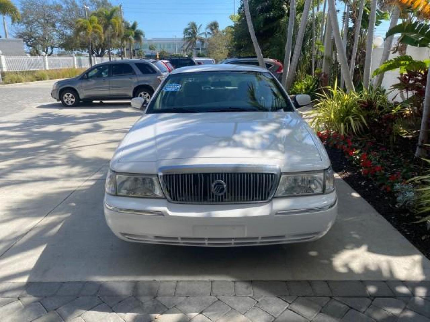 2005 Vibrant White /Medium Parchment Mercury Grand Marquis GS LOW MILES 49,348 (2MEFM74W85X) with an 4.6L OHC SEFI V8 Engine engine, Automatic transmission, located at 4701 North Dixie Hwy, Pompano Beach, FL, 33064, (954) 422-2889, 26.240938, -80.123474 - OUR WEBPAGE FLORIDACARS1.COM HAS OVER 100 PHOTOS AND FREE CARFAX LINK 2005 MERCURY GRAND MARQUIS GS VIN: 2MEFM74W85X603873 2 M E F M 7 4 W 8 5 X 6 0 3 8 7 3 SEDAN 4 DR 4.6L V8 F DOHC GASOLINE 25 MPG REAR WHEEL DRIVE Features ABS Brakes Air Conditioning AM/FM Stereo Automatic Transmission CD Audio Cl- Photo#95