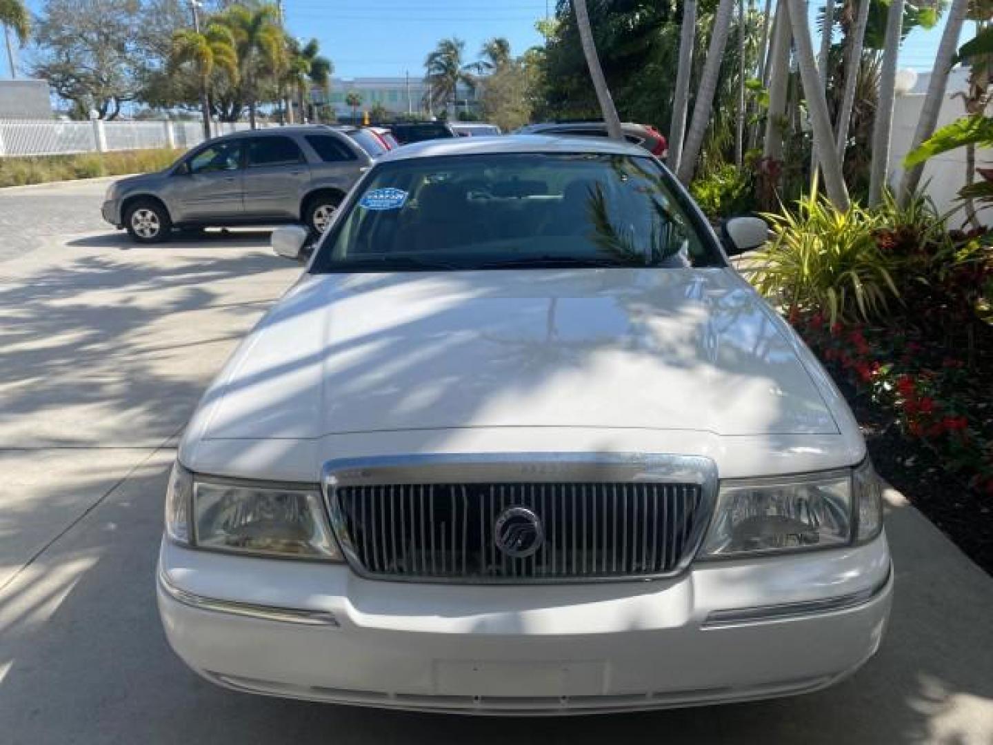 2005 Vibrant White /Medium Parchment Mercury Grand Marquis GS LOW MILES 49,348 (2MEFM74W85X) with an 4.6L OHC SEFI V8 Engine engine, Automatic transmission, located at 4701 North Dixie Hwy, Pompano Beach, FL, 33064, (954) 422-2889, 26.240938, -80.123474 - OUR WEBPAGE FLORIDACARS1.COM HAS OVER 100 PHOTOS AND FREE CARFAX LINK 2005 MERCURY GRAND MARQUIS GS VIN: 2MEFM74W85X603873 2 M E F M 7 4 W 8 5 X 6 0 3 8 7 3 SEDAN 4 DR 4.6L V8 F DOHC GASOLINE 25 MPG REAR WHEEL DRIVE Features ABS Brakes Air Conditioning AM/FM Stereo Automatic Transmission CD Audio Cl- Photo#96