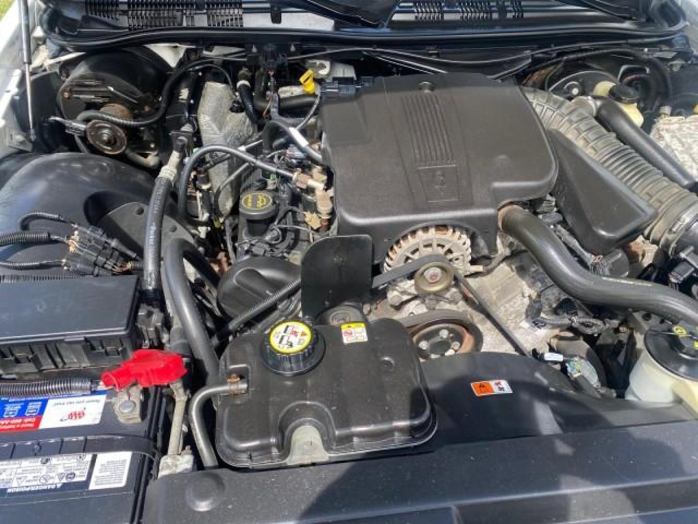 2005 Vibrant White /Medium Parchment Mercury Grand Marquis GS LOW MILES 49,348 (2MEFM74W85X) with an 4.6L OHC SEFI V8 Engine engine, Automatic transmission, located at 4701 North Dixie Hwy, Pompano Beach, FL, 33064, (954) 422-2889, 26.240938, -80.123474 - OUR WEBPAGE FLORIDACARS1.COM HAS OVER 100 PHOTOS AND FREE CARFAX LINK 2005 MERCURY GRAND MARQUIS GS VIN: 2MEFM74W85X603873 2 M E F M 7 4 W 8 5 X 6 0 3 8 7 3 SEDAN 4 DR 4.6L V8 F DOHC GASOLINE 25 MPG REAR WHEEL DRIVE Features ABS Brakes Air Conditioning AM/FM Stereo Automatic Transmission CD Audio Cl- Photo#24