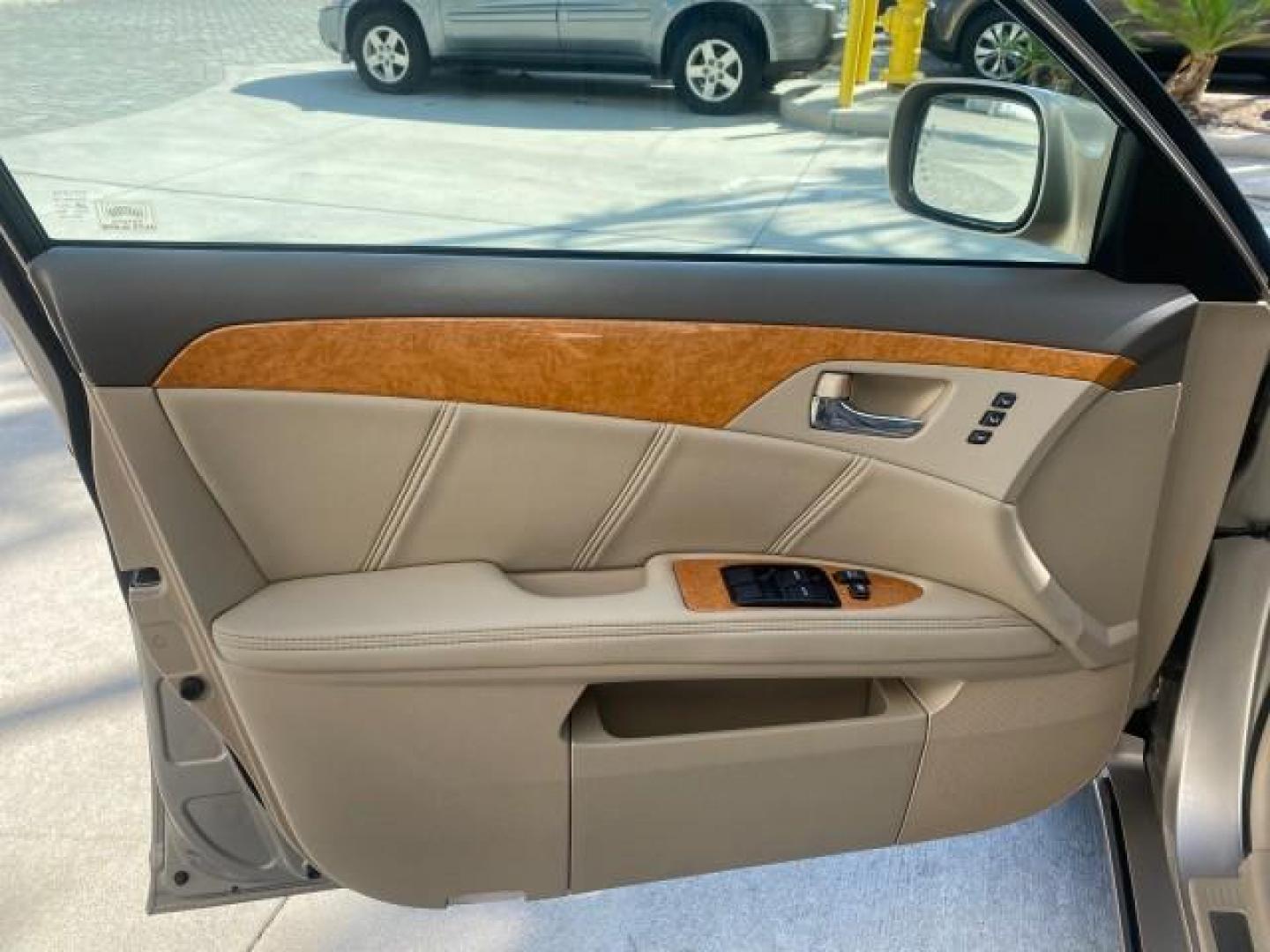 2007 Desert Sand Mica /Graphite Toyota Avalon XL Limited LOW MILES 73,237 (4T1BK36BX7U) with an 3.5L DOHC EFI 24-Valve V6 Engine engine, Automatic transmission, located at 4701 North Dixie Hwy, Pompano Beach, FL, 33064, (954) 422-2889, 26.240938, -80.123474 - OUR WEBPAGE FLORIDACARS1.COM HAS OVER 100 PHOTOS AND FREE CARFAX LINK 2007 TOYOTA AVALON XL LIMITED SUNROOF LEATHER LOADED NEW $34,065 VIN: 4T1BK36BX7U252561 4 T 1 B K 3 6 B X 7 U 2 5 2 5 6 1 SEDAN 4 DR 3.5L V6 F DOHC 24V GASOLINE 28 MPG FRONT WHEEL DRIVE Features A/C Seat(s) ABS Brakes Air Conditio - Photo#41