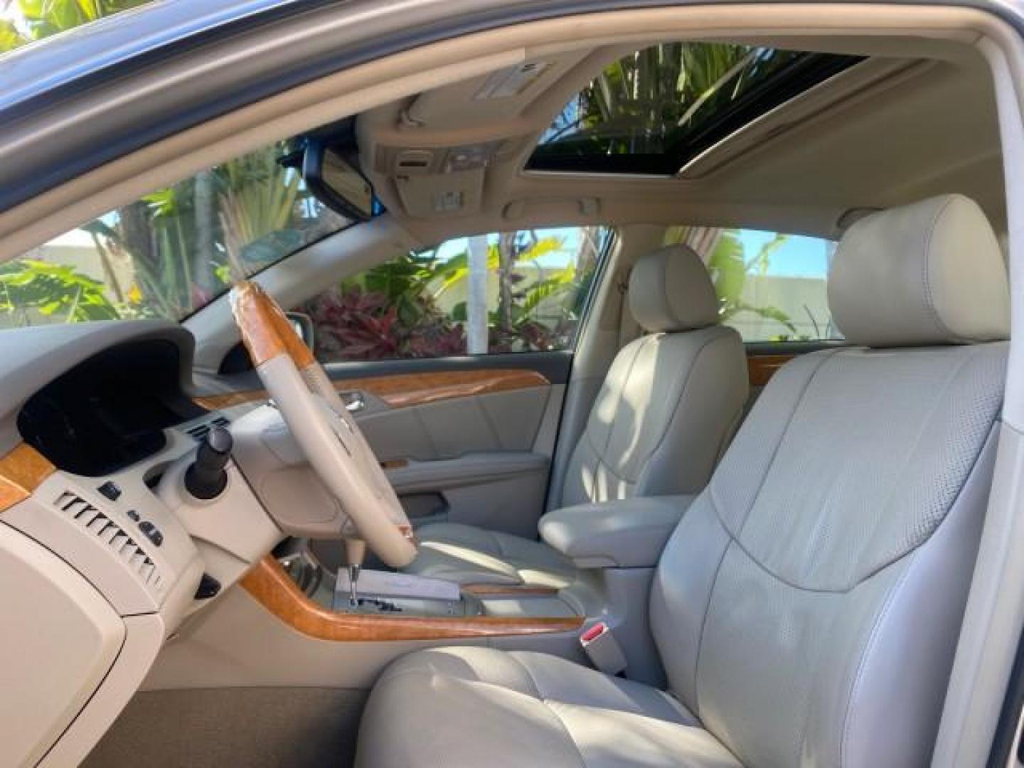 2007 Desert Sand Mica /Graphite Toyota Avalon XL Limited LOW MILES 73,237 (4T1BK36BX7U) with an 3.5L DOHC EFI 24-Valve V6 Engine engine, Automatic transmission, located at 4701 North Dixie Hwy, Pompano Beach, FL, 33064, (954) 422-2889, 26.240938, -80.123474 - OUR WEBPAGE FLORIDACARS1.COM HAS OVER 100 PHOTOS AND FREE CARFAX LINK 2007 TOYOTA AVALON XL LIMITED SUNROOF LEATHER LOADED NEW $34,065 VIN: 4T1BK36BX7U252561 4 T 1 B K 3 6 B X 7 U 2 5 2 5 6 1 SEDAN 4 DR 3.5L V6 F DOHC 24V GASOLINE 28 MPG FRONT WHEEL DRIVE Features A/C Seat(s) ABS Brakes Air Conditio - Photo#43