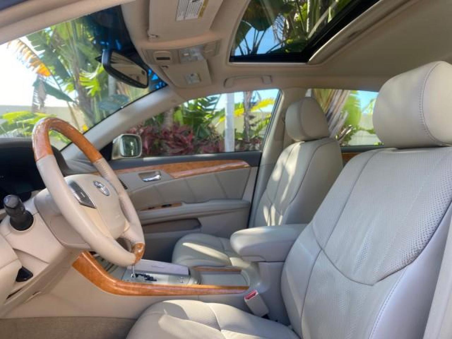 2007 Desert Sand Mica /Graphite Toyota Avalon XL Limited LOW MILES 73,237 (4T1BK36BX7U) with an 3.5L DOHC EFI 24-Valve V6 Engine engine, Automatic transmission, located at 4701 North Dixie Hwy, Pompano Beach, FL, 33064, (954) 422-2889, 26.240938, -80.123474 - OUR WEBPAGE FLORIDACARS1.COM HAS OVER 100 PHOTOS AND FREE CARFAX LINK 2007 TOYOTA AVALON XL LIMITED SUNROOF LEATHER LOADED NEW $34,065 VIN: 4T1BK36BX7U252561 4 T 1 B K 3 6 B X 7 U 2 5 2 5 6 1 SEDAN 4 DR 3.5L V6 F DOHC 24V GASOLINE 28 MPG FRONT WHEEL DRIVE Features A/C Seat(s) ABS Brakes Air Conditio - Photo#44
