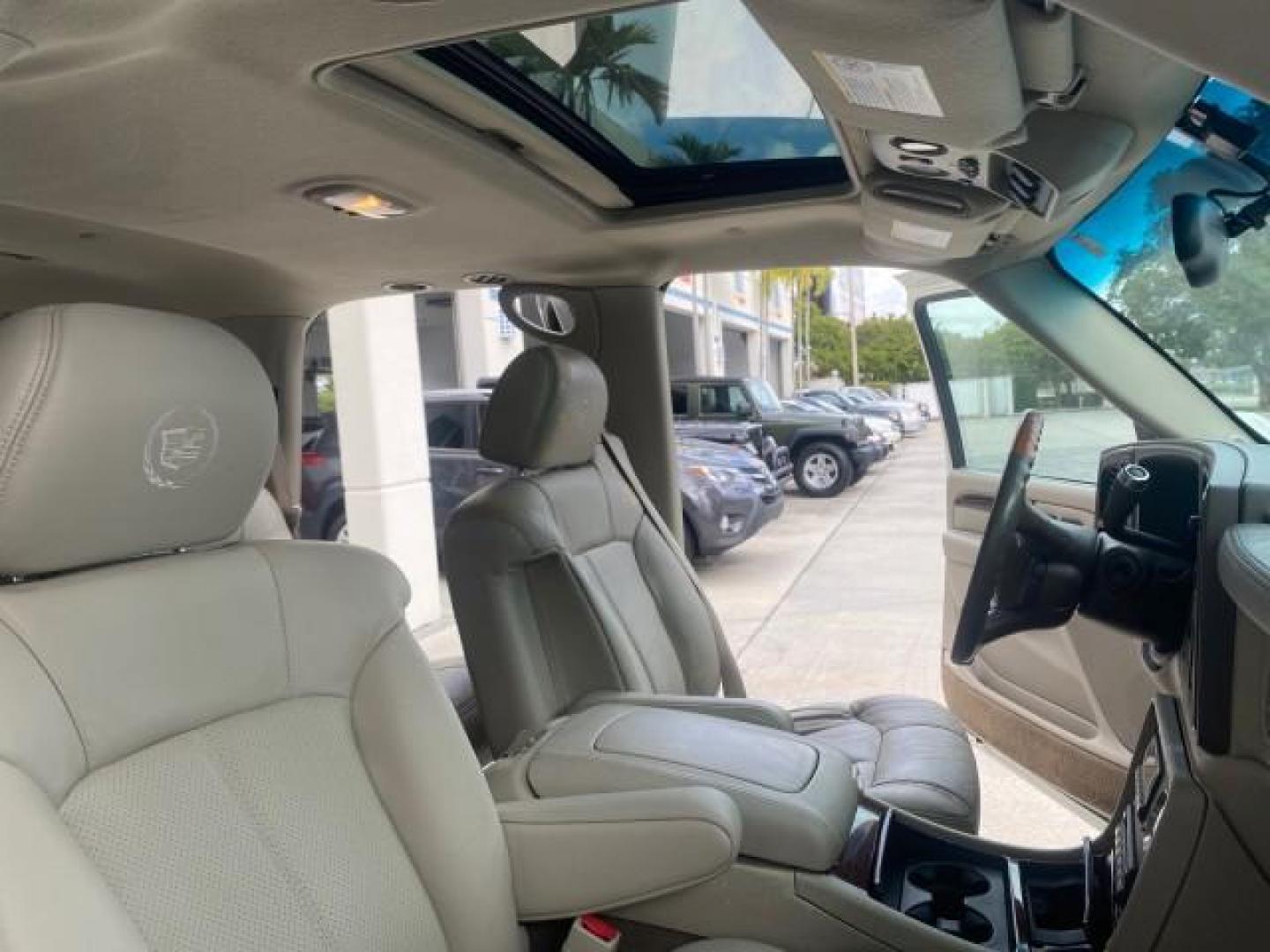 2002 White Diamond /Pewter Cadillac Escalade LOW MILES 67,881 1 OWNER (1GYEC63T92R) with an 5.3L Vortec 1000 SFI V8 Engine engine, Automatic transmission, located at 4701 North Dixie Hwy, Pompano Beach, FL, 33064, (954) 422-2889, 26.240938, -80.123474 - OUR WEBPAGE FLORIDACARS1.COM HAS OVER 100 PHOTOS AND FREE CARFAX LINK 2002 CADILLAC ESCALADE 1 OWNER SUNROOF WHITE DIAMOND PEARL NEW $48,735 VIN: 1GYEC63T92R185082 1 G Y E C 6 3 T 9 2 R 1 8 5 0 8 2 4 DOOR WAGON/SPORT UTILITY 5.3L V8 F GASOLINE 18 MPG REAR WHEEL DRIVE Features ABS Brakes Air Conditio - Photo#12