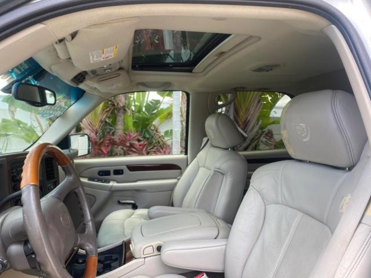 2002 White Diamond /Pewter Cadillac Escalade LOW MILES 67,881 1 OWNER (1GYEC63T92R) with an 5.3L Vortec 1000 SFI V8 Engine engine, Automatic transmission, located at 4701 North Dixie Hwy, Pompano Beach, FL, 33064, (954) 422-2889, 26.240938, -80.123474 - OUR WEBPAGE FLORIDACARS1.COM HAS OVER 100 PHOTOS AND FREE CARFAX LINK 2002 CADILLAC ESCALADE 1 OWNER SUNROOF WHITE DIAMOND PEARL NEW $48,735 VIN: 1GYEC63T92R185082 1 G Y E C 6 3 T 9 2 R 1 8 5 0 8 2 4 DOOR WAGON/SPORT UTILITY 5.3L V8 F GASOLINE 18 MPG REAR WHEEL DRIVE Features ABS Brakes Air Conditio - Photo#42
