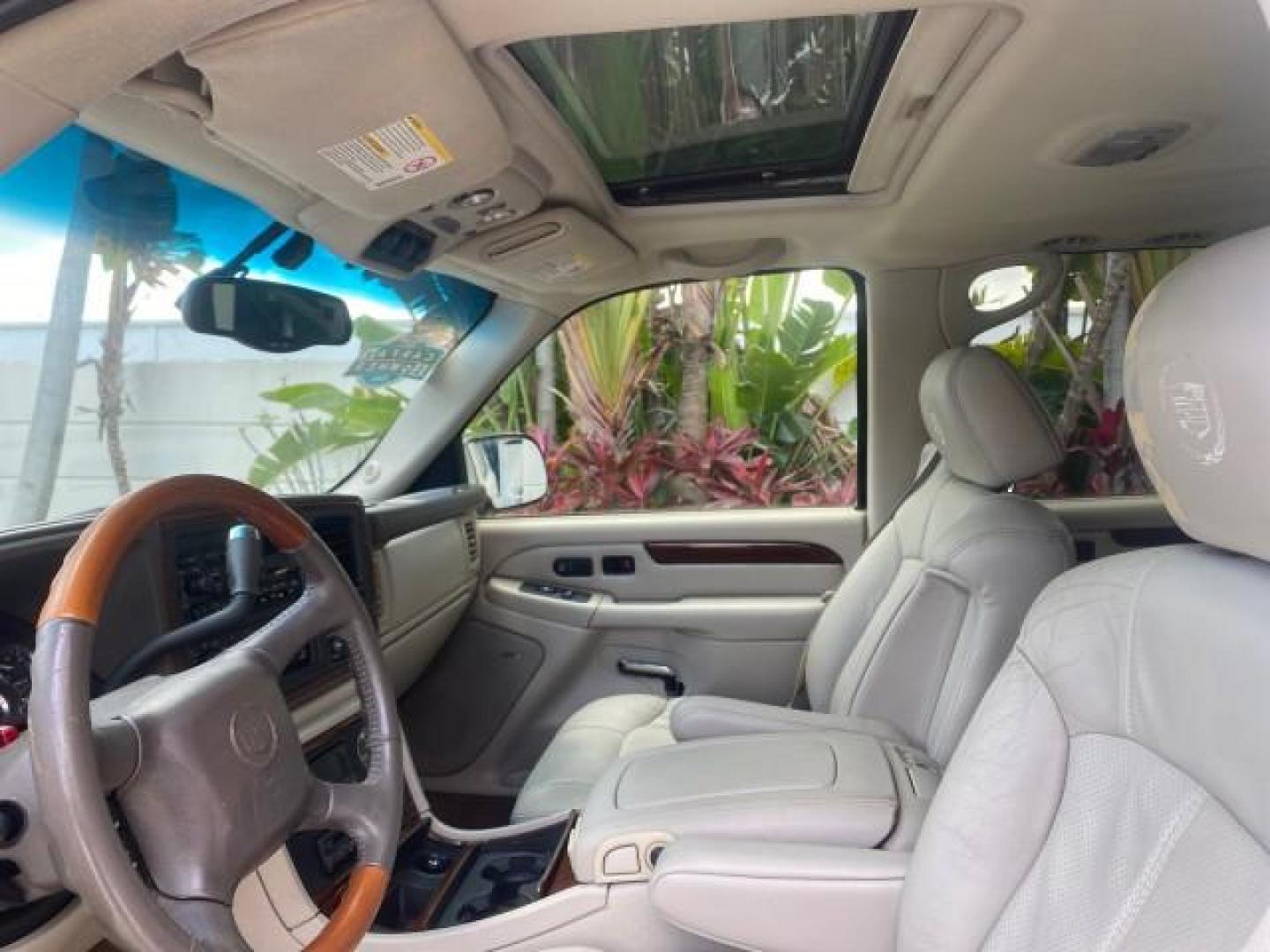2002 White Diamond /Pewter Cadillac Escalade LOW MILES 67,881 1 OWNER (1GYEC63T92R) with an 5.3L Vortec 1000 SFI V8 Engine engine, Automatic transmission, located at 4701 North Dixie Hwy, Pompano Beach, FL, 33064, (954) 422-2889, 26.240938, -80.123474 - OUR WEBPAGE FLORIDACARS1.COM HAS OVER 100 PHOTOS AND FREE CARFAX LINK 2002 CADILLAC ESCALADE 1 OWNER SUNROOF WHITE DIAMOND PEARL NEW $48,735 VIN: 1GYEC63T92R185082 1 G Y E C 6 3 T 9 2 R 1 8 5 0 8 2 4 DOOR WAGON/SPORT UTILITY 5.3L V8 F GASOLINE 18 MPG REAR WHEEL DRIVE Features ABS Brakes Air Conditio - Photo#43