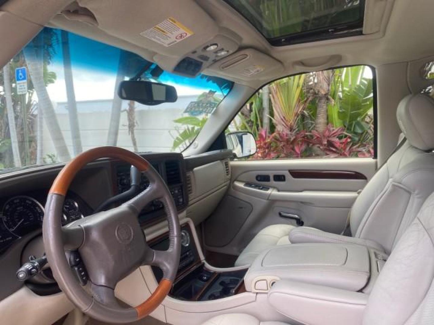 2002 White Diamond /Pewter Cadillac Escalade LOW MILES 67,881 1 OWNER (1GYEC63T92R) with an 5.3L Vortec 1000 SFI V8 Engine engine, Automatic transmission, located at 4701 North Dixie Hwy, Pompano Beach, FL, 33064, (954) 422-2889, 26.240938, -80.123474 - OUR WEBPAGE FLORIDACARS1.COM HAS OVER 100 PHOTOS AND FREE CARFAX LINK 2002 CADILLAC ESCALADE 1 OWNER SUNROOF WHITE DIAMOND PEARL NEW $48,735 VIN: 1GYEC63T92R185082 1 G Y E C 6 3 T 9 2 R 1 8 5 0 8 2 4 DOOR WAGON/SPORT UTILITY 5.3L V8 F GASOLINE 18 MPG REAR WHEEL DRIVE Features ABS Brakes Air Conditio - Photo#44