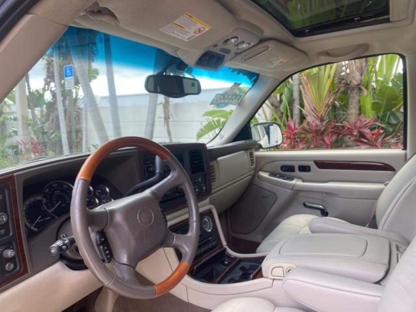 2002 White Diamond /Pewter Cadillac Escalade LOW MILES 67,881 1 OWNER (1GYEC63T92R) with an 5.3L Vortec 1000 SFI V8 Engine engine, Automatic transmission, located at 4701 North Dixie Hwy, Pompano Beach, FL, 33064, (954) 422-2889, 26.240938, -80.123474 - OUR WEBPAGE FLORIDACARS1.COM HAS OVER 100 PHOTOS AND FREE CARFAX LINK 2002 CADILLAC ESCALADE 1 OWNER SUNROOF WHITE DIAMOND PEARL NEW $48,735 VIN: 1GYEC63T92R185082 1 G Y E C 6 3 T 9 2 R 1 8 5 0 8 2 4 DOOR WAGON/SPORT UTILITY 5.3L V8 F GASOLINE 18 MPG REAR WHEEL DRIVE Features ABS Brakes Air Conditio - Photo#45