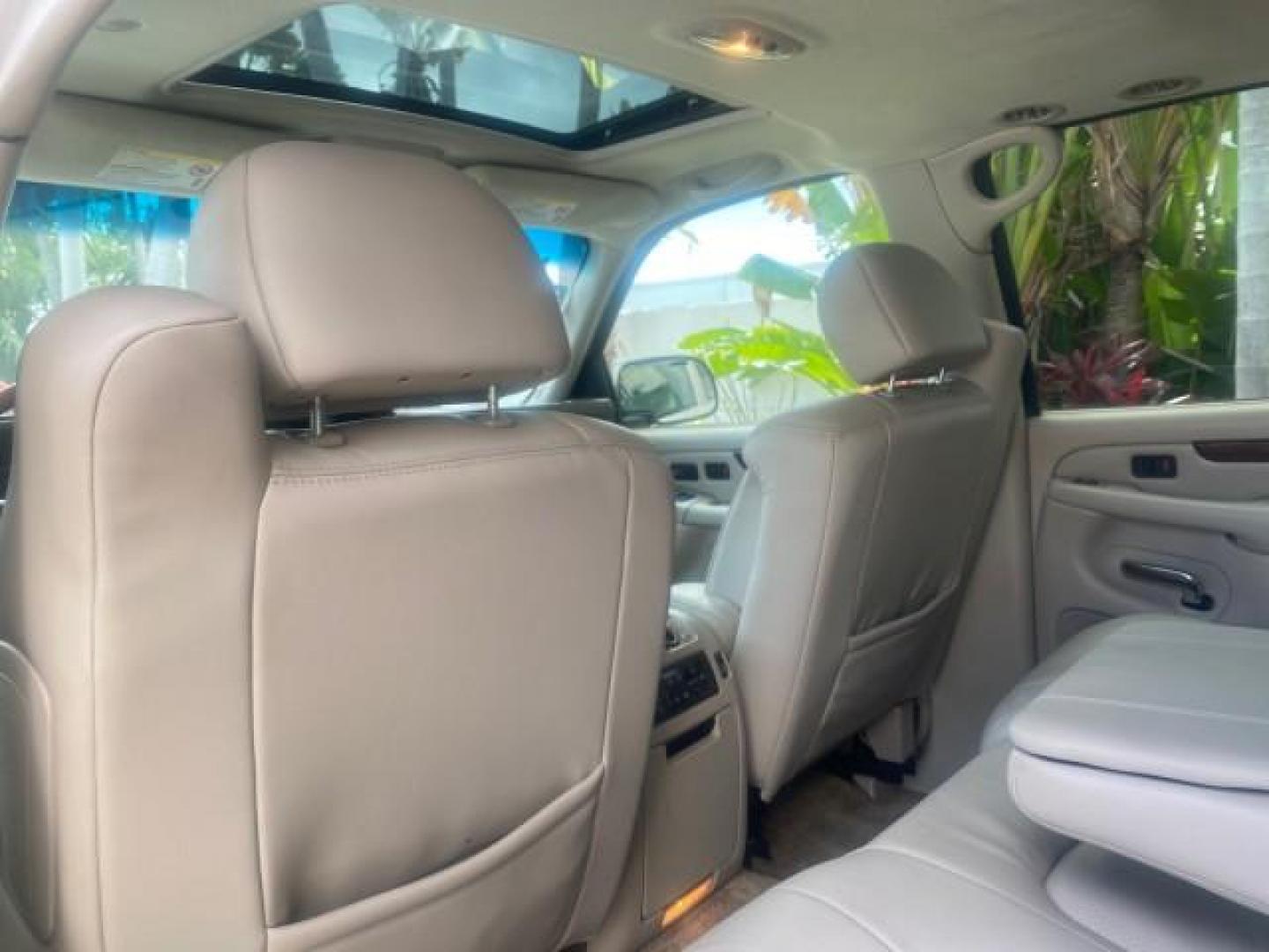 2002 White Diamond /Pewter Cadillac Escalade LOW MILES 67,881 1 OWNER (1GYEC63T92R) with an 5.3L Vortec 1000 SFI V8 Engine engine, Automatic transmission, located at 4701 North Dixie Hwy, Pompano Beach, FL, 33064, (954) 422-2889, 26.240938, -80.123474 - OUR WEBPAGE FLORIDACARS1.COM HAS OVER 100 PHOTOS AND FREE CARFAX LINK 2002 CADILLAC ESCALADE 1 OWNER SUNROOF WHITE DIAMOND PEARL NEW $48,735 VIN: 1GYEC63T92R185082 1 G Y E C 6 3 T 9 2 R 1 8 5 0 8 2 4 DOOR WAGON/SPORT UTILITY 5.3L V8 F GASOLINE 18 MPG REAR WHEEL DRIVE Features ABS Brakes Air Conditio - Photo#80