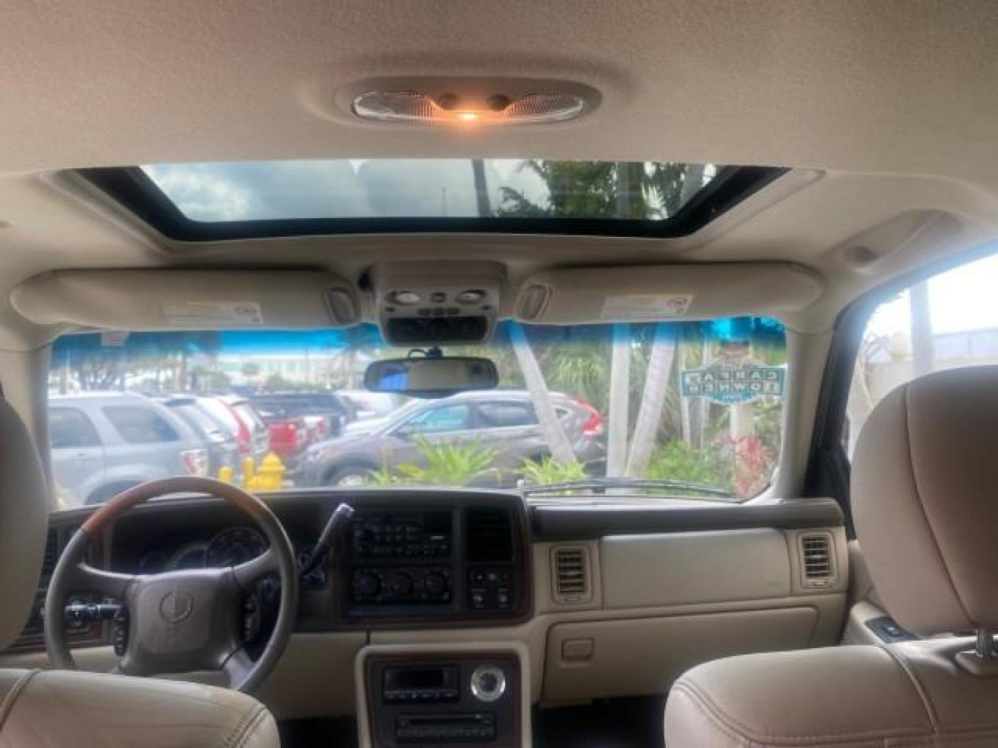 2002 White Diamond /Pewter Cadillac Escalade LOW MILES 67,881 1 OWNER (1GYEC63T92R) with an 5.3L Vortec 1000 SFI V8 Engine engine, Automatic transmission, located at 4701 North Dixie Hwy, Pompano Beach, FL, 33064, (954) 422-2889, 26.240938, -80.123474 - OUR WEBPAGE FLORIDACARS1.COM HAS OVER 100 PHOTOS AND FREE CARFAX LINK 2002 CADILLAC ESCALADE 1 OWNER SUNROOF WHITE DIAMOND PEARL NEW $48,735 VIN: 1GYEC63T92R185082 1 G Y E C 6 3 T 9 2 R 1 8 5 0 8 2 4 DOOR WAGON/SPORT UTILITY 5.3L V8 F GASOLINE 18 MPG REAR WHEEL DRIVE Features ABS Brakes Air Conditio - Photo#85