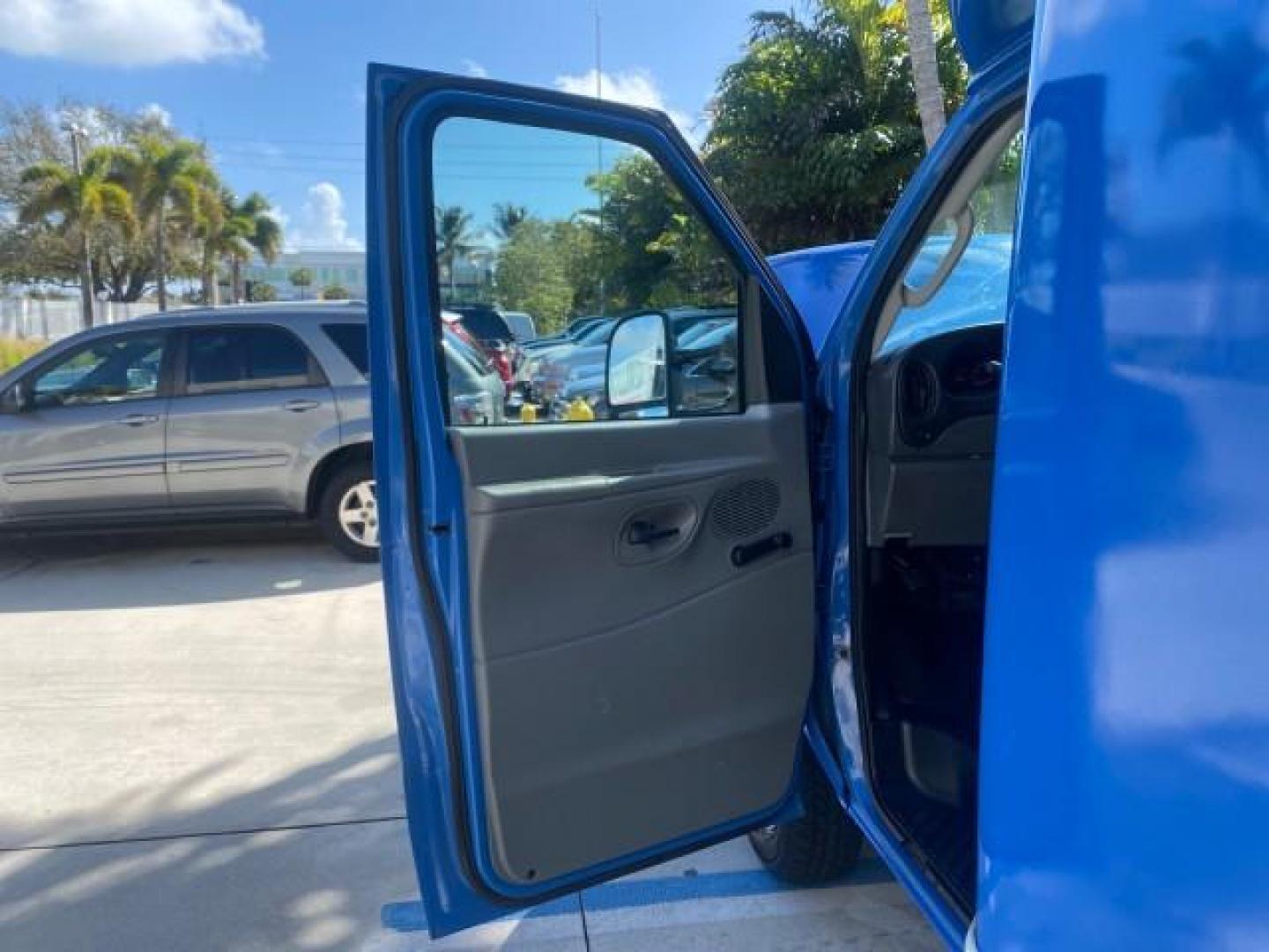 2006 True Blue Metallic /Medium Flint Ford Econoline Commercial Cutaway LOW MILES 27,641 1 OWNER (1FDWE35L16H) with an 5.4L SOHC EFI Triton V8 Engine engine, Automatic transmission, located at 4701 North Dixie Hwy, Pompano Beach, FL, 33064, (954) 422-2889, 26.240938, -80.123474 - OUR WEBPAGE FLORIDACARS1.COM HAS OVER 100 PHOTOS AND FREE CARFAX LINK 2006 FORD E350 SUPER DUTY 1 OWNER DUTY 13 FT BOX TRUCK VIN: 1FDWE35L16HB37597 1 F D W E 3 5 L 1 6 H B 3 7 5 9 7 CUTAWAY 5.4L V8 F GASOLINE REAR WHEEL DRIVE Features ABS Brakes Air Conditioning AM/FM Stereo Automatic Transmission V- Photo#9