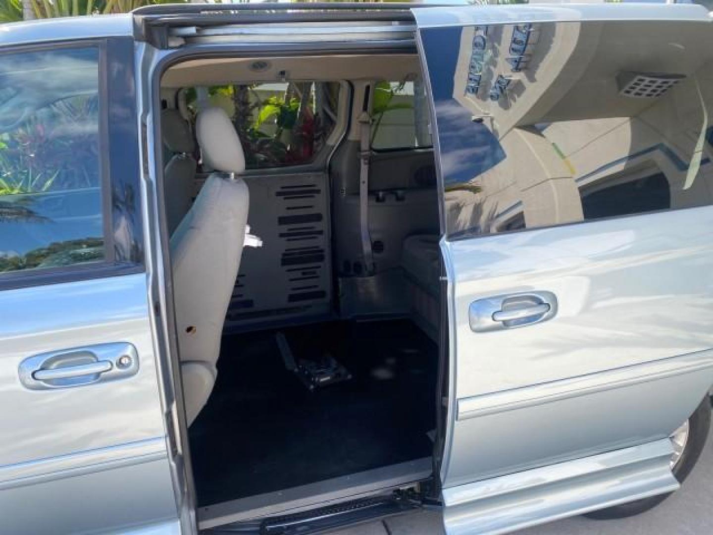 2006 Butane Blue Pearl /Med Slate Gray Chrysler T and C BRAUN ENTERVAN HANDICAP LOW MILES 64,097 (1A4GP44R76B) with an 3.3L OHV V6 Engine engine, Automatic transmission, located at 4701 North Dixie Hwy, Pompano Beach, FL, 33064, (954) 422-2889, 26.240938, -80.123474 - OUR WEBPAGE FLORIDACARS1.COM HAS OVER 100 PHOTOS AND FREE CARFAX LINK 2006 CHRYSLER TOWN AND COUNTRY LX BRAUN ENTERVAN $20,000 PLUS CONVERSION POWER RAMP DRIVER SEAT SWIVELS VIN: 1A4GP44R76B751954 1 A 4 G P 4 4 R 7 6 B 7 5 1 9 5 4 VAN 3.3L V6 F OHV 24V GASOLINE 26 MPG FRONT WHEEL DRIVE Features ABS- Photo#89
