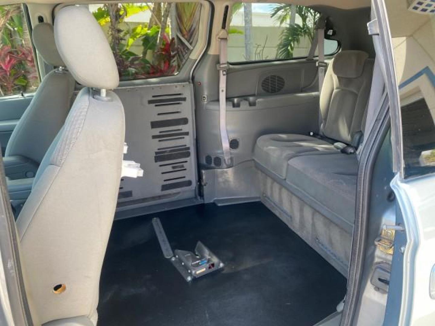 2006 Butane Blue Pearl /Med Slate Gray Chrysler T and C BRAUN ENTERVAN HANDICAP LOW MILES 64,097 (1A4GP44R76B) with an 3.3L OHV V6 Engine engine, Automatic transmission, located at 4701 North Dixie Hwy, Pompano Beach, FL, 33064, (954) 422-2889, 26.240938, -80.123474 - OUR WEBPAGE FLORIDACARS1.COM HAS OVER 100 PHOTOS AND FREE CARFAX LINK 2006 CHRYSLER TOWN AND COUNTRY LX BRAUN ENTERVAN $20,000 PLUS CONVERSION POWER RAMP DRIVER SEAT SWIVELS VIN: 1A4GP44R76B751954 1 A 4 G P 4 4 R 7 6 B 7 5 1 9 5 4 VAN 3.3L V6 F OHV 24V GASOLINE 26 MPG FRONT WHEEL DRIVE Features ABS- Photo#90
