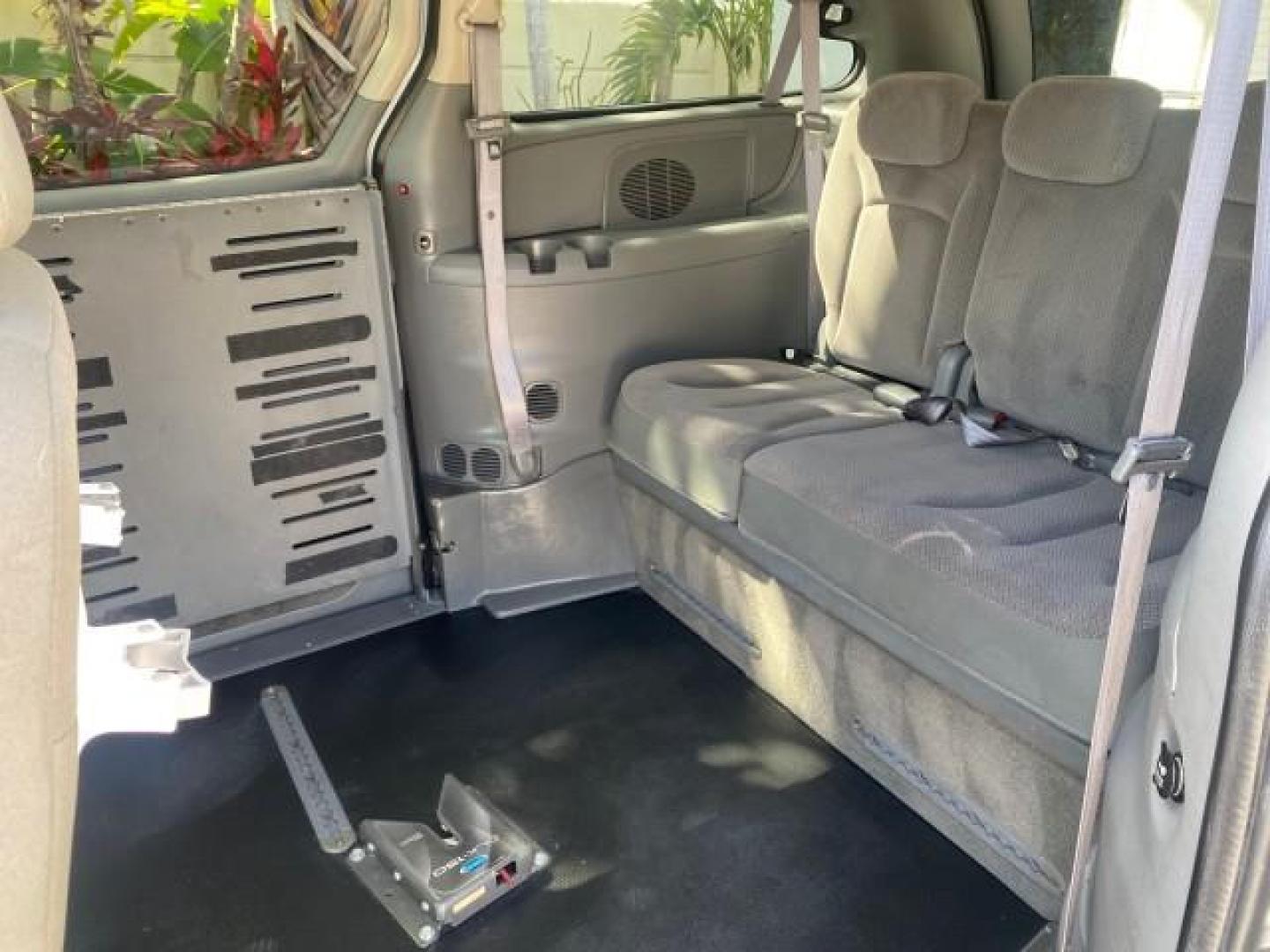 2006 Butane Blue Pearl /Med Slate Gray Chrysler T and C BRAUN ENTERVAN HANDICAP LOW MILES 64,097 (1A4GP44R76B) with an 3.3L OHV V6 Engine engine, Automatic transmission, located at 4701 North Dixie Hwy, Pompano Beach, FL, 33064, (954) 422-2889, 26.240938, -80.123474 - OUR WEBPAGE FLORIDACARS1.COM HAS OVER 100 PHOTOS AND FREE CARFAX LINK 2006 CHRYSLER TOWN AND COUNTRY LX BRAUN ENTERVAN $20,000 PLUS CONVERSION POWER RAMP DRIVER SEAT SWIVELS VIN: 1A4GP44R76B751954 1 A 4 G P 4 4 R 7 6 B 7 5 1 9 5 4 VAN 3.3L V6 F OHV 24V GASOLINE 26 MPG FRONT WHEEL DRIVE Features ABS- Photo#91