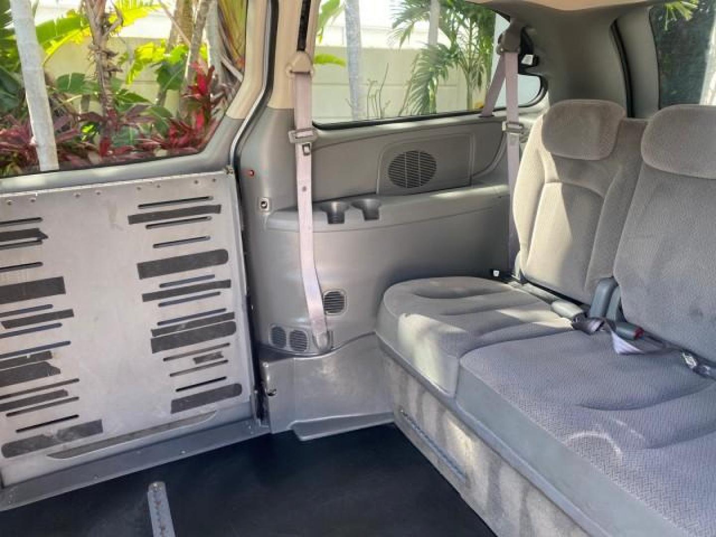 2006 Butane Blue Pearl /Med Slate Gray Chrysler T and C BRAUN ENTERVAN HANDICAP LOW MILES 64,097 (1A4GP44R76B) with an 3.3L OHV V6 Engine engine, Automatic transmission, located at 4701 North Dixie Hwy, Pompano Beach, FL, 33064, (954) 422-2889, 26.240938, -80.123474 - OUR WEBPAGE FLORIDACARS1.COM HAS OVER 100 PHOTOS AND FREE CARFAX LINK 2006 CHRYSLER TOWN AND COUNTRY LX BRAUN ENTERVAN $20,000 PLUS CONVERSION POWER RAMP DRIVER SEAT SWIVELS VIN: 1A4GP44R76B751954 1 A 4 G P 4 4 R 7 6 B 7 5 1 9 5 4 VAN 3.3L V6 F OHV 24V GASOLINE 26 MPG FRONT WHEEL DRIVE Features ABS- Photo#94