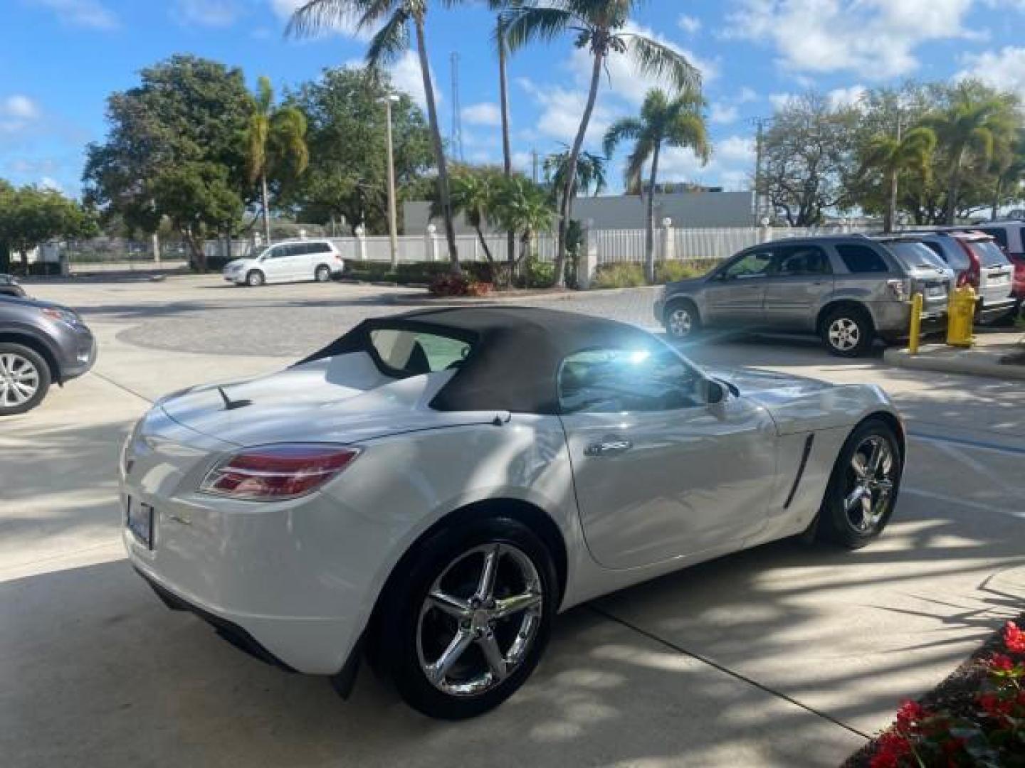 2008 Polar White /Black Saturn Sky Red Line LOW MILES 29,810 SOFT TOP (1G8MF35X78Y) with an Turbocharged And Intercooled Ecotec 2.0L VVT DOHC 4-Cyl Aluminum Engine engine, Automatic transmission, located at 4701 North Dixie Hwy, Pompano Beach, FL, 33064, (954) 422-2889, 26.240938, -80.123474 - OUR WEBPAGE FLORIDACARS1.COM HAS OVER 100 PHOTOS AND FREE CARFAX LINK 2008 SATURN SKY RED LINE TOP OF THE LINE TURBO FAST VIN: 1G8MF35X78Y121221 1 G 8 M F 3 5 X 7 8 Y 1 2 1 2 2 1 CONVERTIBLE 2.0L I4 F DOHC GASOLINE 31 MPG REAR WHEEL DRIVE Features ABS Brakes Air Conditioning Alloy Wheels AM/FM Stere - Photo#7