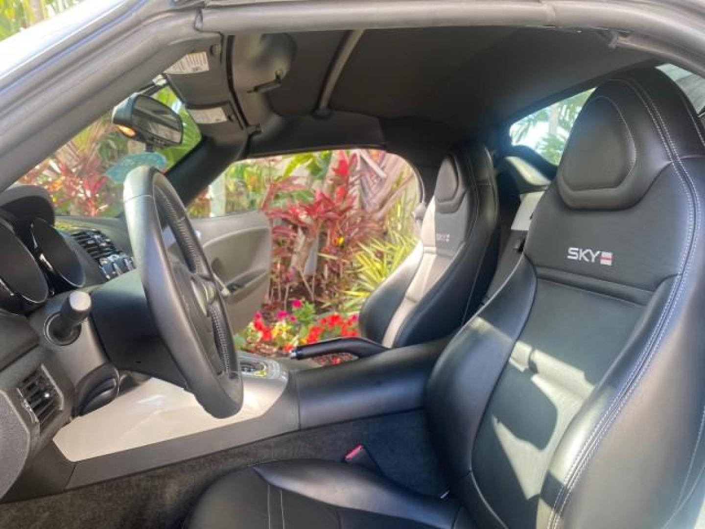 2008 Polar White /Black Saturn Sky Red Line LOW MILES 29,810 SOFT TOP (1G8MF35X78Y) with an Turbocharged And Intercooled Ecotec 2.0L VVT DOHC 4-Cyl Aluminum Engine engine, Automatic transmission, located at 4701 North Dixie Hwy, Pompano Beach, FL, 33064, (954) 422-2889, 26.240938, -80.123474 - OUR WEBPAGE FLORIDACARS1.COM HAS OVER 100 PHOTOS AND FREE CARFAX LINK 2008 SATURN SKY RED LINE TOP OF THE LINE TURBO FAST VIN: 1G8MF35X78Y121221 1 G 8 M F 3 5 X 7 8 Y 1 2 1 2 2 1 CONVERTIBLE 2.0L I4 F DOHC GASOLINE 31 MPG REAR WHEEL DRIVE Features ABS Brakes Air Conditioning Alloy Wheels AM/FM Stere - Photo#10