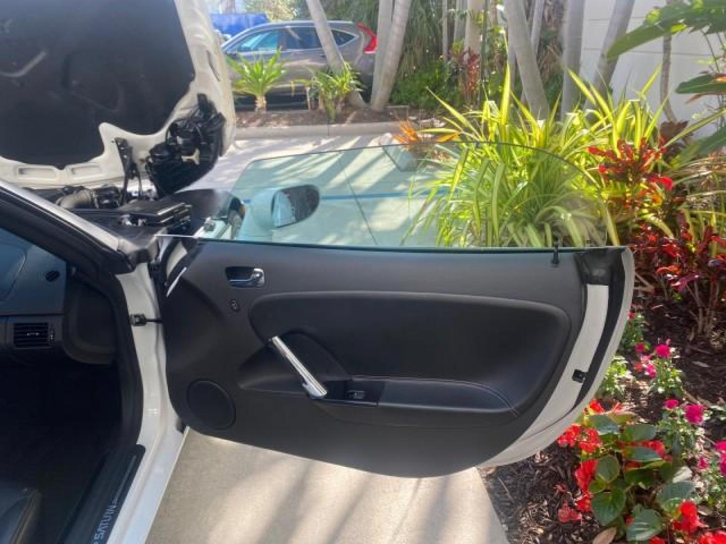 2008 Polar White /Black Saturn Sky Red Line LOW MILES 29,810 SOFT TOP (1G8MF35X78Y) with an Turbocharged And Intercooled Ecotec 2.0L VVT DOHC 4-Cyl Aluminum Engine engine, Automatic transmission, located at 4701 North Dixie Hwy, Pompano Beach, FL, 33064, (954) 422-2889, 26.240938, -80.123474 - OUR WEBPAGE FLORIDACARS1.COM HAS OVER 100 PHOTOS AND FREE CARFAX LINK 2008 SATURN SKY RED LINE TOP OF THE LINE TURBO FAST VIN: 1G8MF35X78Y121221 1 G 8 M F 3 5 X 7 8 Y 1 2 1 2 2 1 CONVERTIBLE 2.0L I4 F DOHC GASOLINE 31 MPG REAR WHEEL DRIVE Features ABS Brakes Air Conditioning Alloy Wheels AM/FM Stere - Photo#11