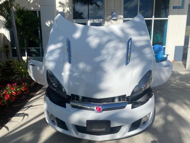 2008 Polar White /Black Saturn Sky Red Line LOW MILES 29,810 SOFT TOP (1G8MF35X78Y) with an Turbocharged And Intercooled Ecotec 2.0L VVT DOHC 4-Cyl Aluminum Engine engine, Automatic transmission, located at 4701 North Dixie Hwy, Pompano Beach, FL, 33064, (954) 422-2889, 26.240938, -80.123474 - OUR WEBPAGE FLORIDACARS1.COM HAS OVER 100 PHOTOS AND FREE CARFAX LINK 2008 SATURN SKY RED LINE TOP OF THE LINE TURBO FAST VIN: 1G8MF35X78Y121221 1 G 8 M F 3 5 X 7 8 Y 1 2 1 2 2 1 CONVERTIBLE 2.0L I4 F DOHC GASOLINE 31 MPG REAR WHEEL DRIVE Features ABS Brakes Air Conditioning Alloy Wheels AM/FM Stere - Photo#17