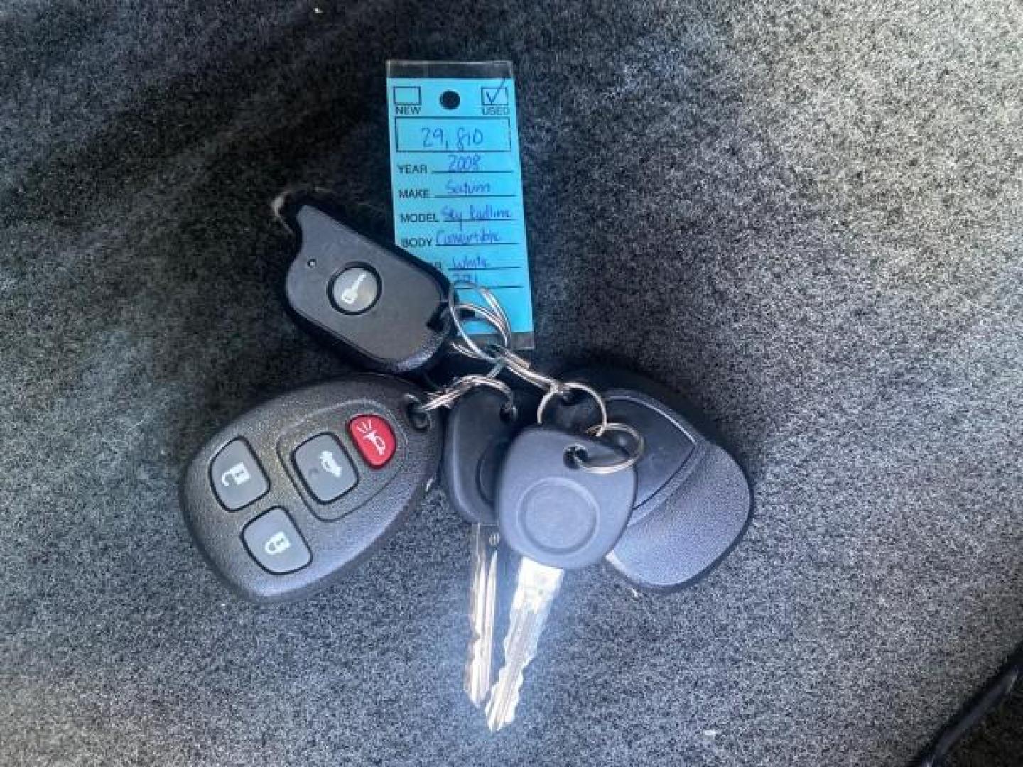 2008 Polar White /Black Saturn Sky Red Line LOW MILES 29,810 SOFT TOP (1G8MF35X78Y) with an Turbocharged And Intercooled Ecotec 2.0L VVT DOHC 4-Cyl Aluminum Engine engine, Automatic transmission, located at 4701 North Dixie Hwy, Pompano Beach, FL, 33064, (954) 422-2889, 26.240938, -80.123474 - OUR WEBPAGE FLORIDACARS1.COM HAS OVER 100 PHOTOS AND FREE CARFAX LINK 2008 SATURN SKY RED LINE TOP OF THE LINE TURBO FAST VIN: 1G8MF35X78Y121221 1 G 8 M F 3 5 X 7 8 Y 1 2 1 2 2 1 CONVERTIBLE 2.0L I4 F DOHC GASOLINE 31 MPG REAR WHEEL DRIVE Features ABS Brakes Air Conditioning Alloy Wheels AM/FM Stere - Photo#23