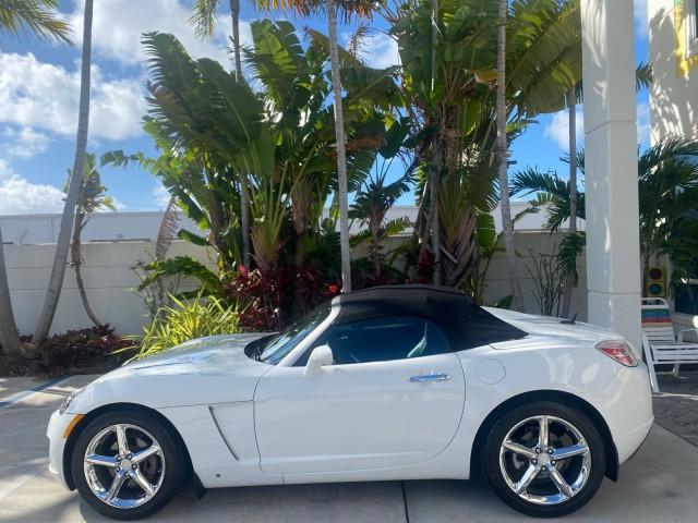 2008 Polar White /Black Saturn Sky Red Line LOW MILES 29,810 SOFT TOP (1G8MF35X78Y) with an Turbocharged And Intercooled Ecotec 2.0L VVT DOHC 4-Cyl Aluminum Engine engine, Automatic transmission, located at 4701 North Dixie Hwy, Pompano Beach, FL, 33064, (954) 422-2889, 26.240938, -80.123474 - OUR WEBPAGE FLORIDACARS1.COM HAS OVER 100 PHOTOS AND FREE CARFAX LINK 2008 SATURN SKY RED LINE TOP OF THE LINE TURBO FAST VIN: 1G8MF35X78Y121221 1 G 8 M F 3 5 X 7 8 Y 1 2 1 2 2 1 CONVERTIBLE 2.0L I4 F DOHC GASOLINE 31 MPG REAR WHEEL DRIVE Features ABS Brakes Air Conditioning Alloy Wheels AM/FM Stere - Photo#31